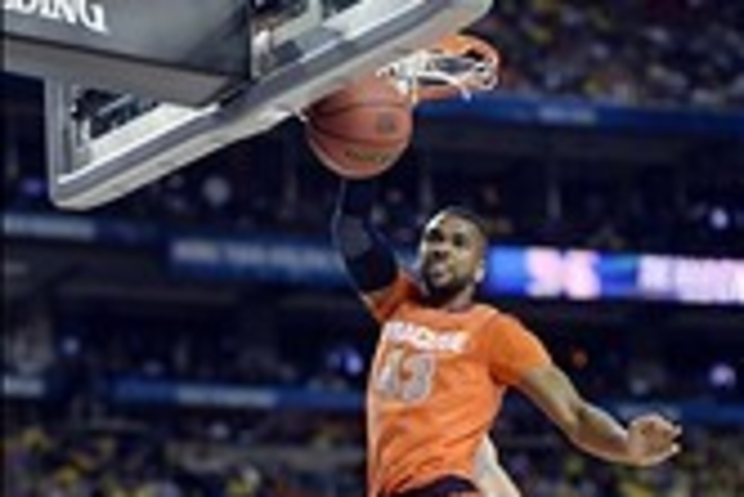 Apr 6, 2013; Atlanta, GA, USA; Syracuse Orange forward James Southerland (43) dunks over Michigan Wolverines forward Mitch McGary (4) in the second half of the semifinals during the 2013 NCAA mens Final Four at the Georgia Dome.  Mandatory Credit: Robert 