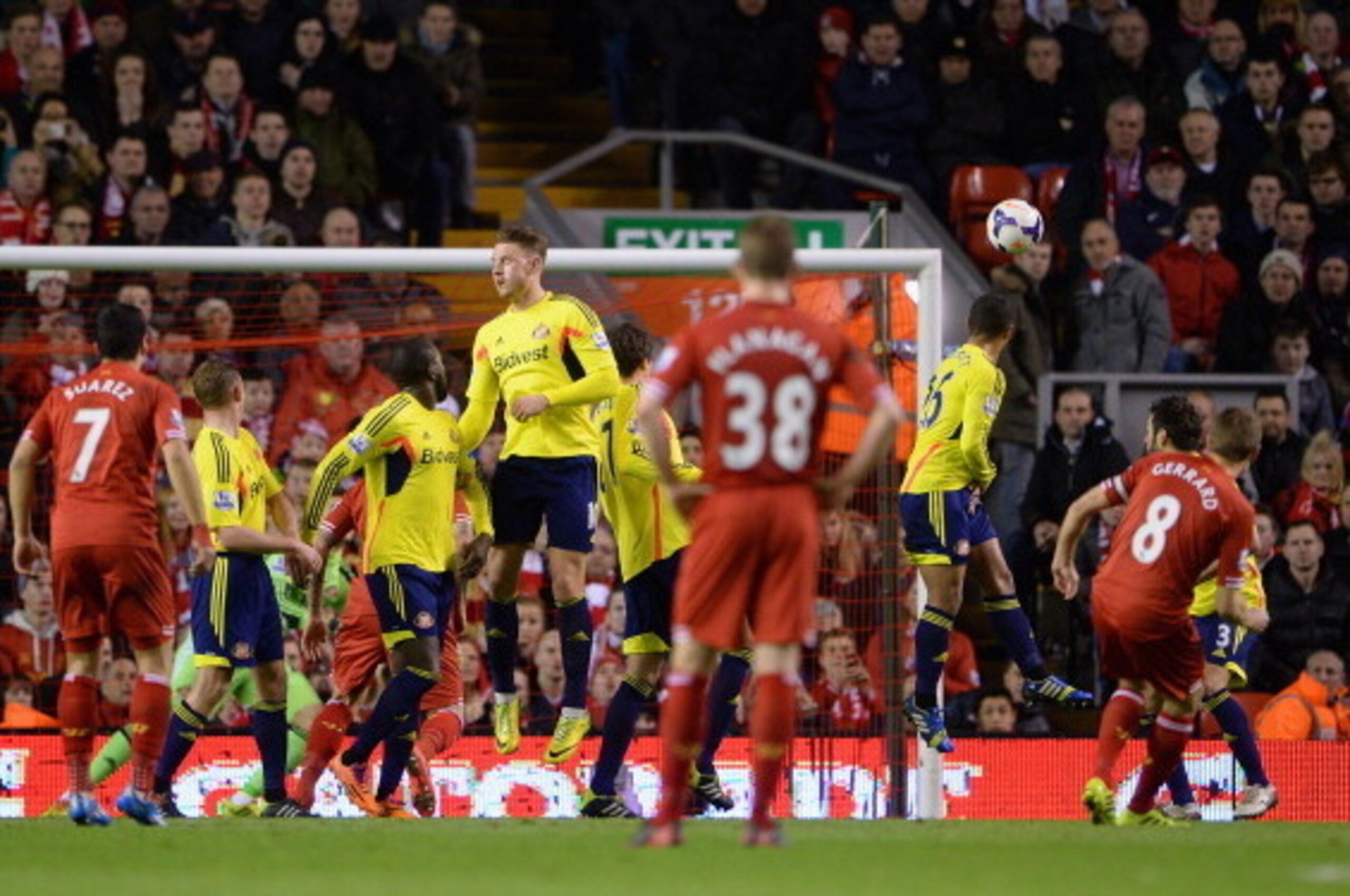 LIVERPOOL, ENGLAND - MARCH 26:  Steven Gerrard of Liverpool scores the first goal from a free-kick during the Barclays Premier League match between Liverpool and Sunderland at Anfield on March 26, 2014 in Liverpool, England.  (Photo by Michael Regan/Getty