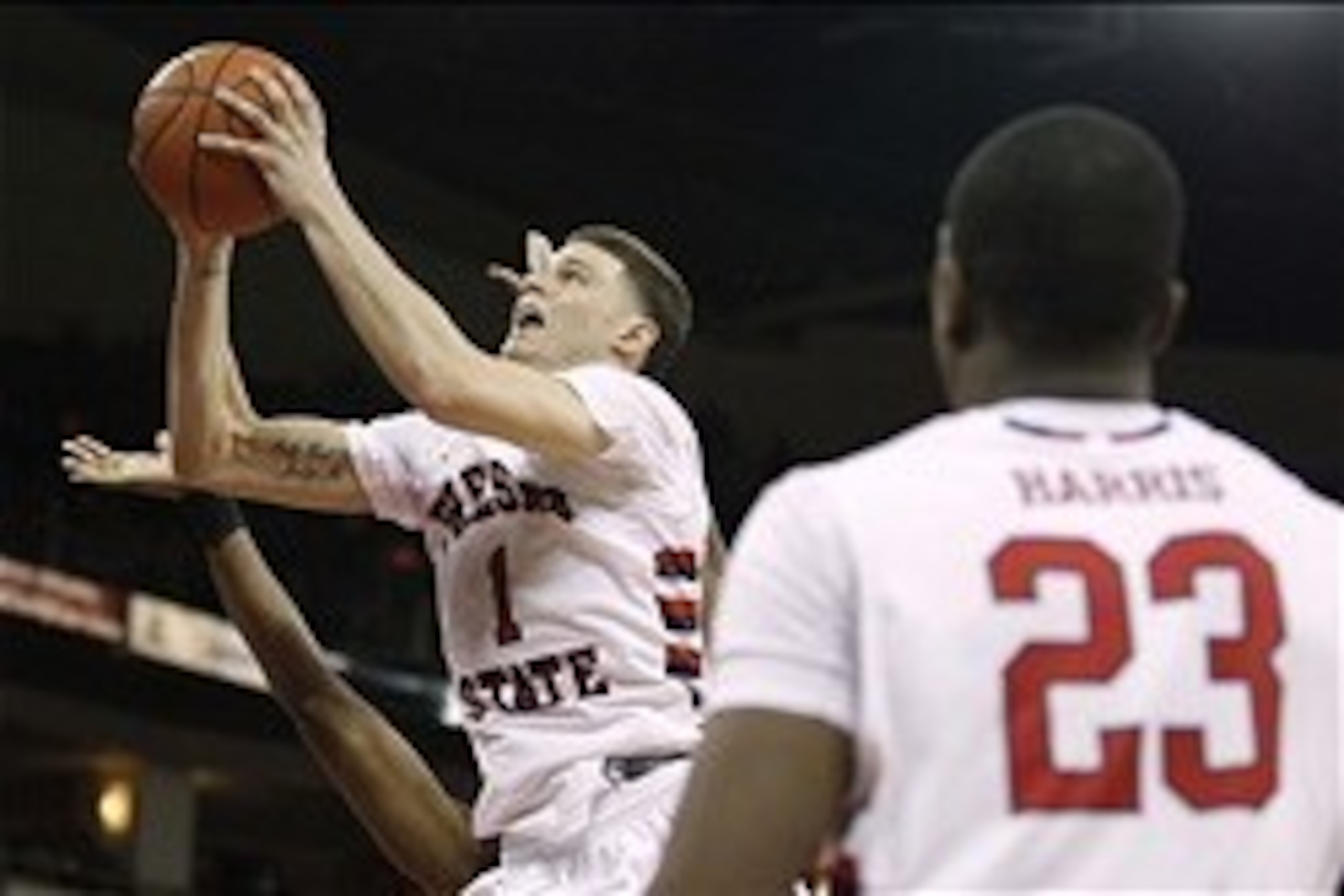 Mar 1, 2014; Fresno, CA, USA; Fresno State Bulldogs guard Tyler Johnson (1) attempts a shot against the San Diego State Aztecs in the second half at the Save Mart Center at Fresno State. The Aztecs defeated the Bulldogs 82-67. Mandatory Credit: Cary Edmon
