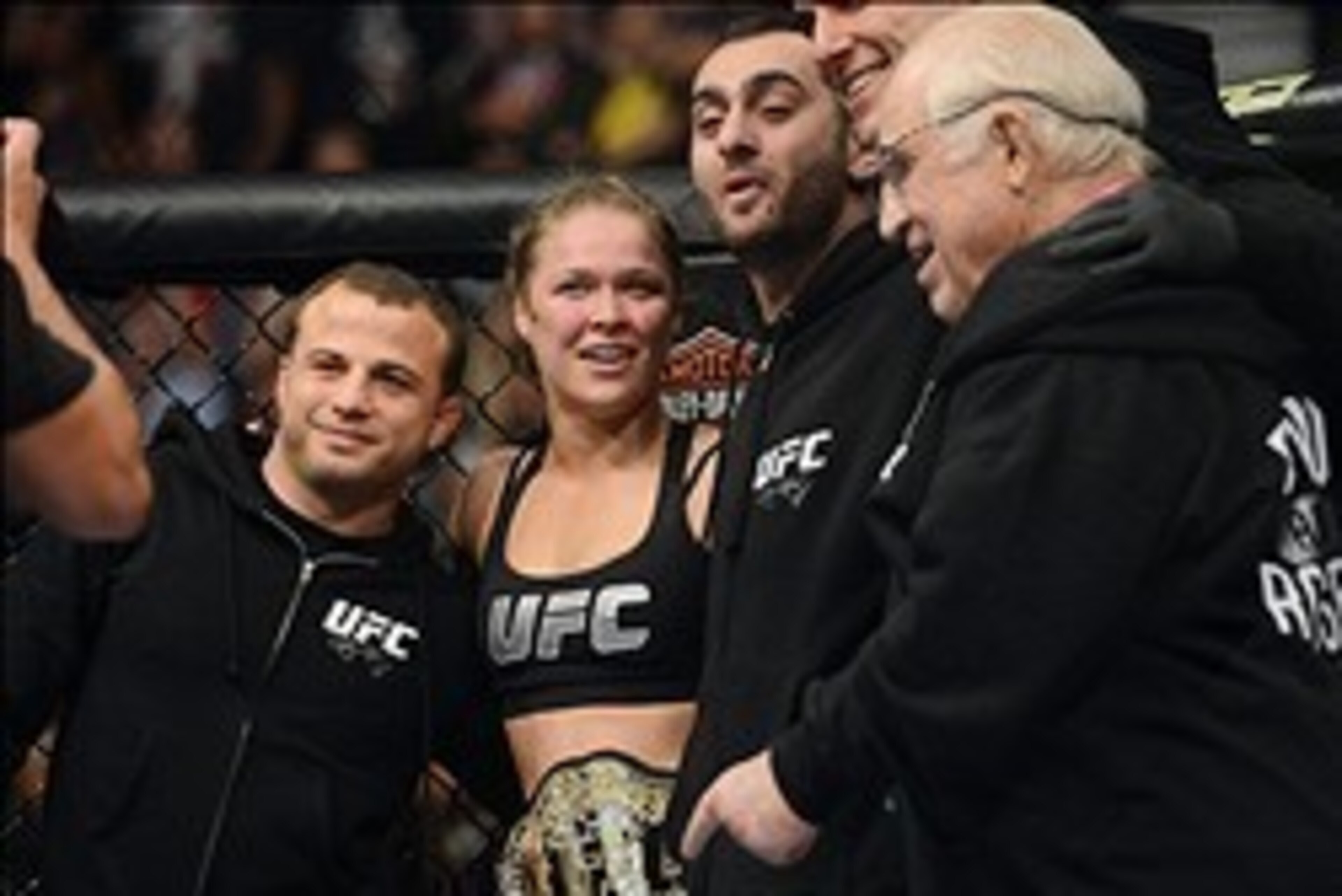Dec 28, 2013; Las Vegas, NV, USA; Ronda Rousey reacts with her corner after defeating Miesha Tate (not pictured) in their UFC women's bantamweight championship bout at the MGM Grand Garden Arena. Mandatory Credit: Jayne Kamin-Oncea-USA TODAY Sports Dec 28, 2013; Las Vegas, NV, USA; Ronda Rousey reacts with her corner after defeating Miesha Tate (not pictured) in their UFC women's bantamweight championship bout at the MGM Grand Garden Arena. Mandatory Credit: Jayne Kamin-Oncea-USA TODAY Sports