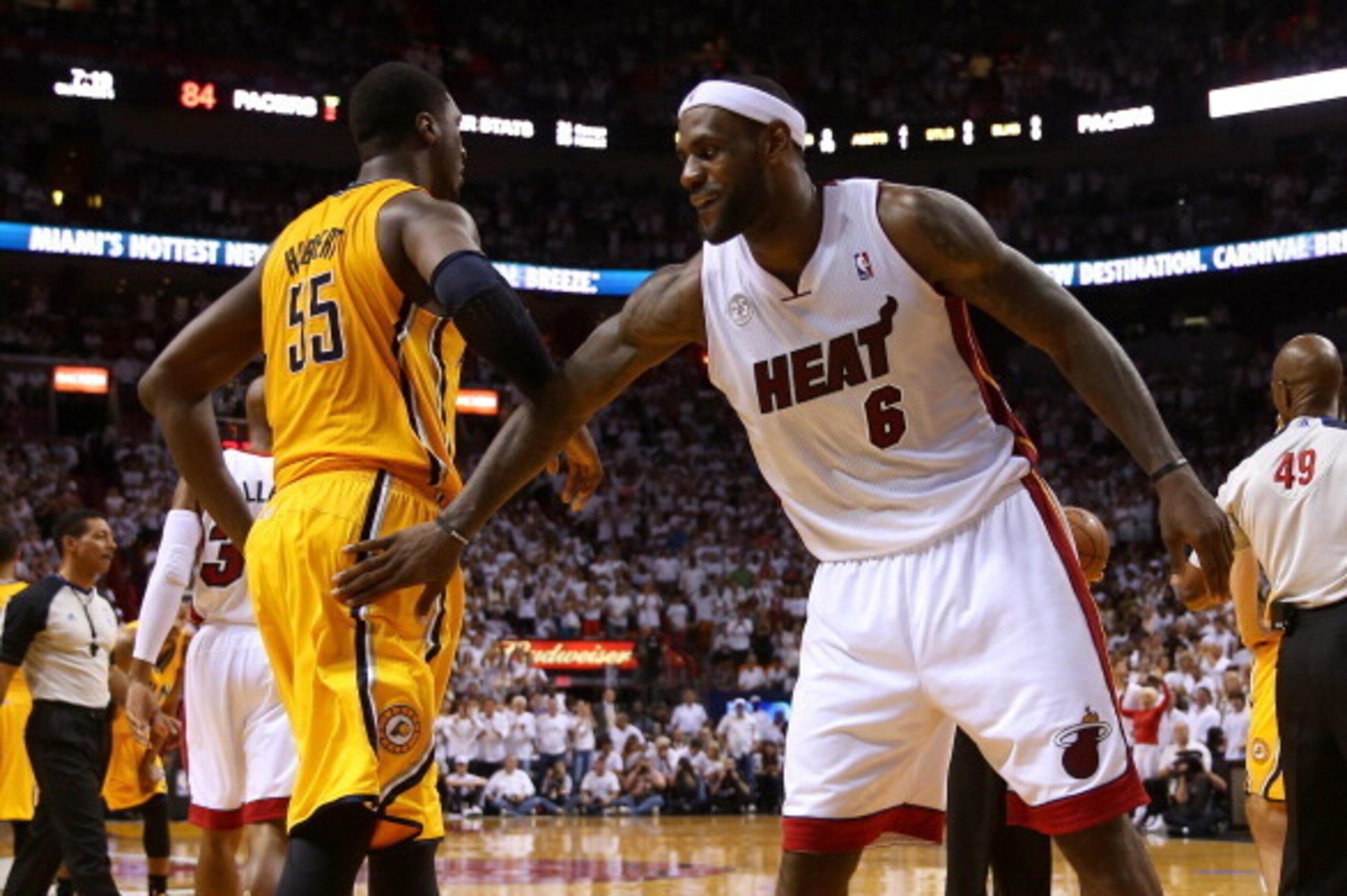 MIAMI, FL - MAY 24: LeBron James #6 of the Miami Heat gestures to Roy Hibbert #55 of the Indiana Pacers after fighting for a loose ball during Game Two of the Eastern Conference Finals at AmericanAirlines Arena on May 24, 2013 in Miami, Florida. NOTE TO U