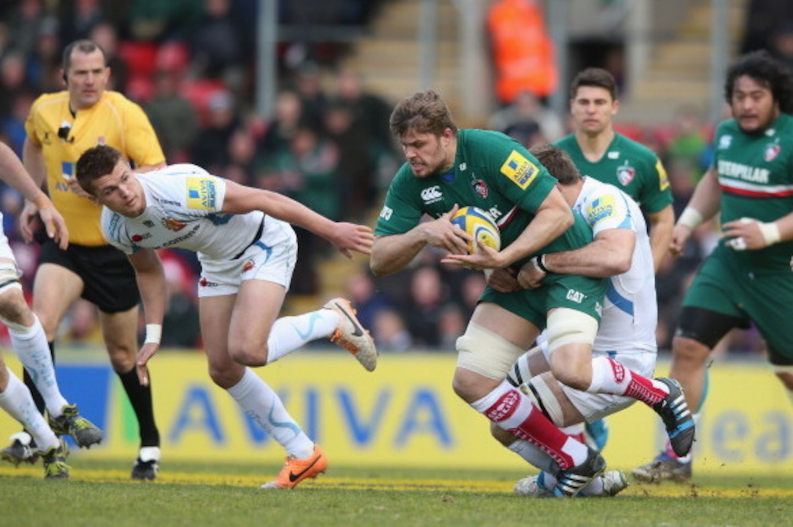 LEICESTER, ENGLAND - MARCH 23:  Ed Slater of Leicester charges upfield during the Aviva Premiership match between Leicester Tigers and Exeter Chiefs at Welford Road on March 23, 2014 in Leicester, England.  (Photo by David Rogers/Getty Images)