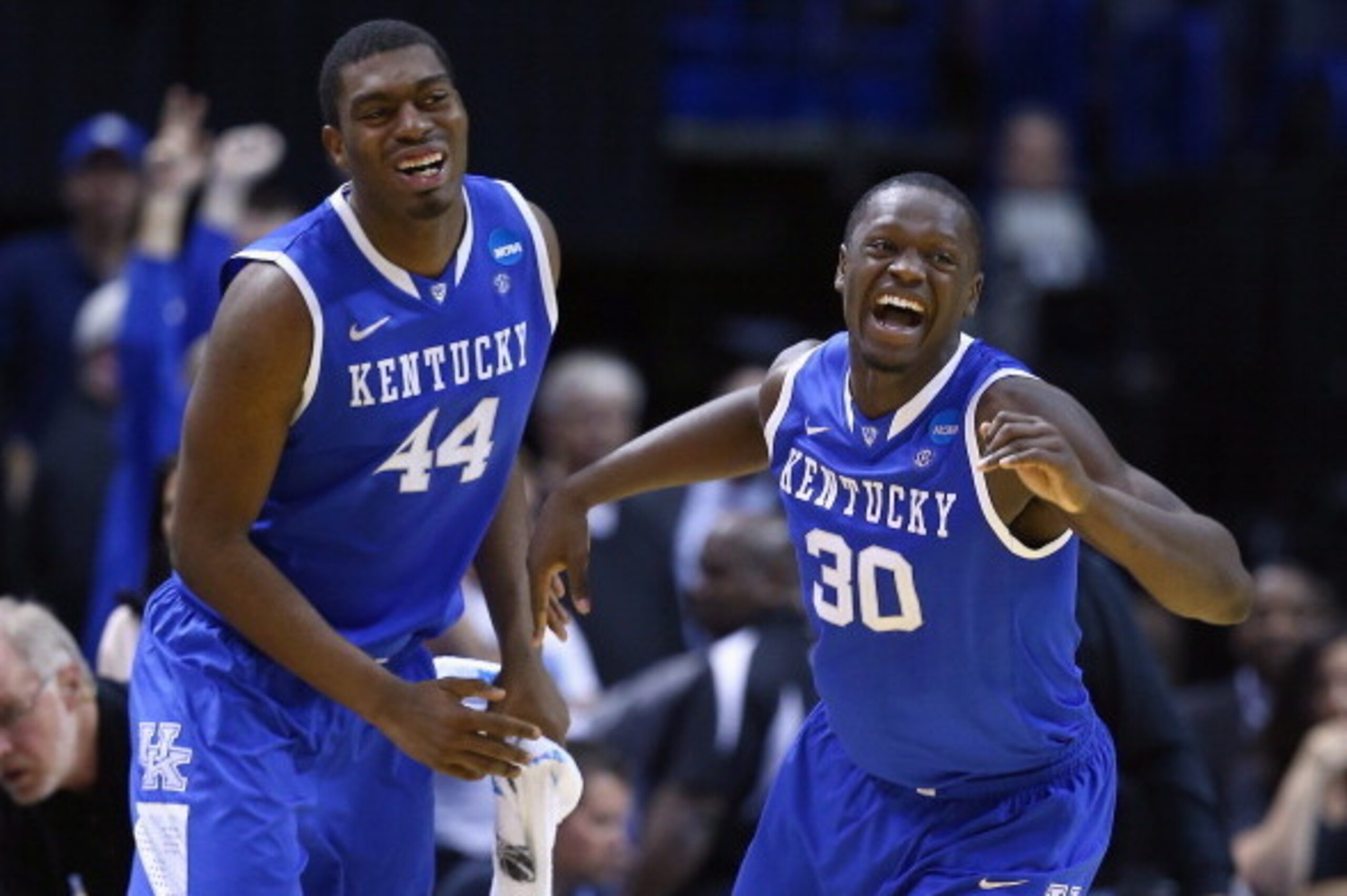 ST LOUIS, MO - MARCH 23:  Julius Randle #30 of the Kentucky Wildcats celebrates with teammate Dakari Johnson #44 after defeating the Wichita State Shockers 78 to 76 during the third round of the 2014 NCAA Men's Basketball Tournament at Scottrade Center on