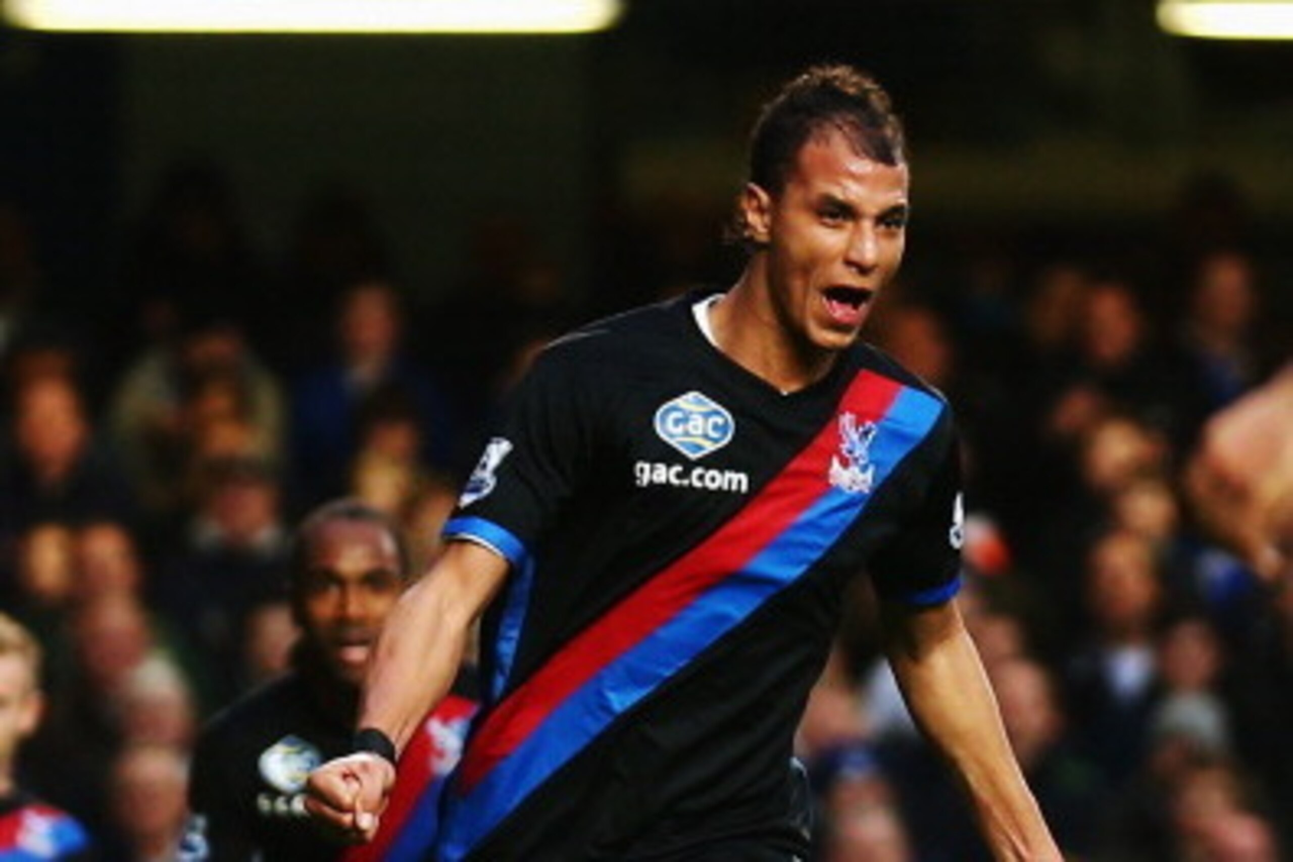 LONDON, ENGLAND - DECEMBER 14:  Marouane Chamakh of Crystal Palace celebrates after scoring during the Barclays Premier League match between Chelsea and Crystal Palace at Stamford Bridge on December 14, 2013 in London, England.  (Photo by Paul Gilham/Gett