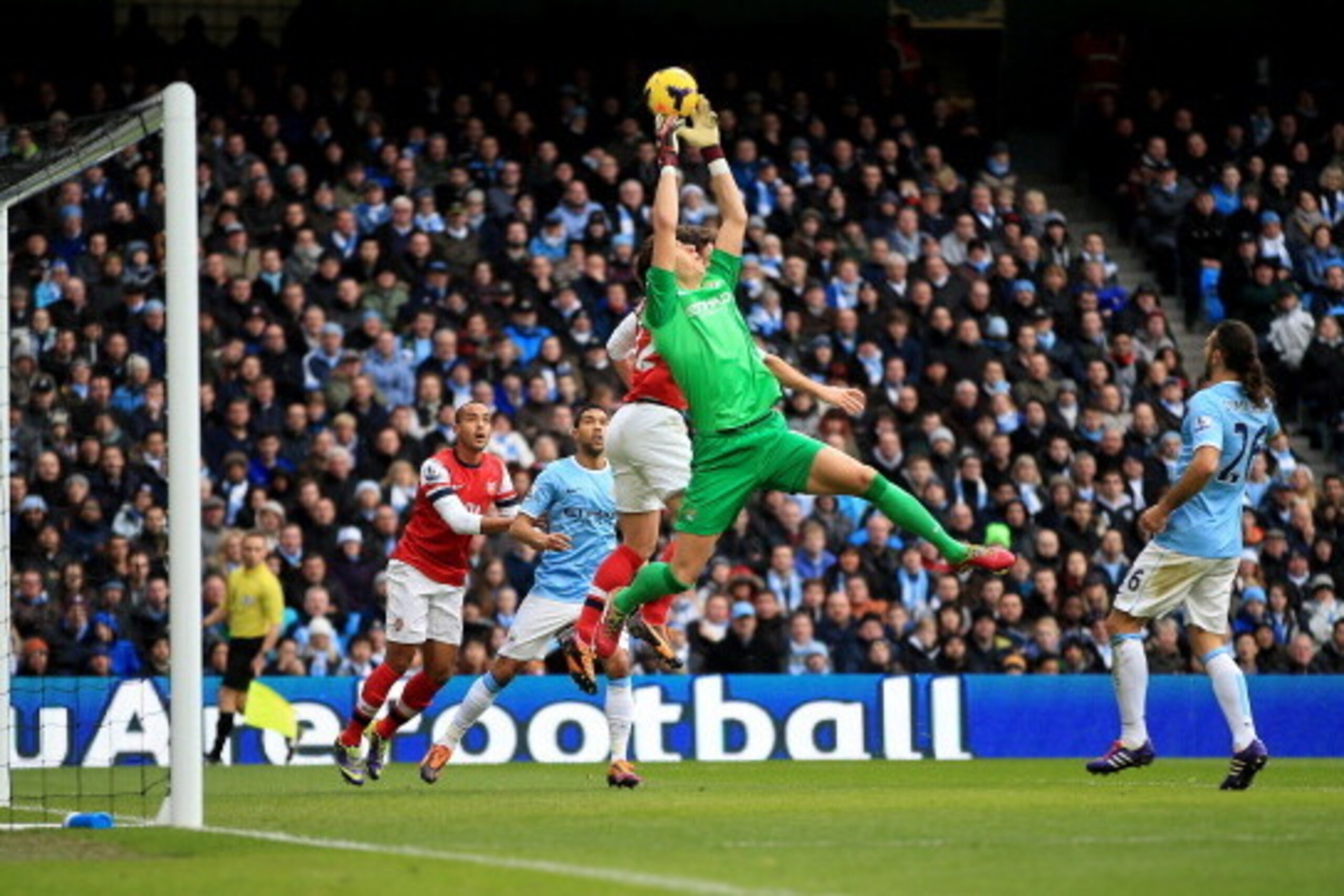MANCHESTER, ENGLAND - DECEMBER 14: Costel Pantilimon of Manchester City fails to hold onto a cross during the Barclays Premier League match between Manchester City and Arsenal at Etihad Stadium on December 14, 2013 in Manchester, England. (Photo by Rich MANCHESTER, ENGLAND - DECEMBER 14: Costel Pantilimon of Manchester City fails to hold onto a cross during the Barclays Premier League match between Manchester City and Arsenal at Etihad Stadium on December 14, 2013 in Manchester, England. (Photo by Rich