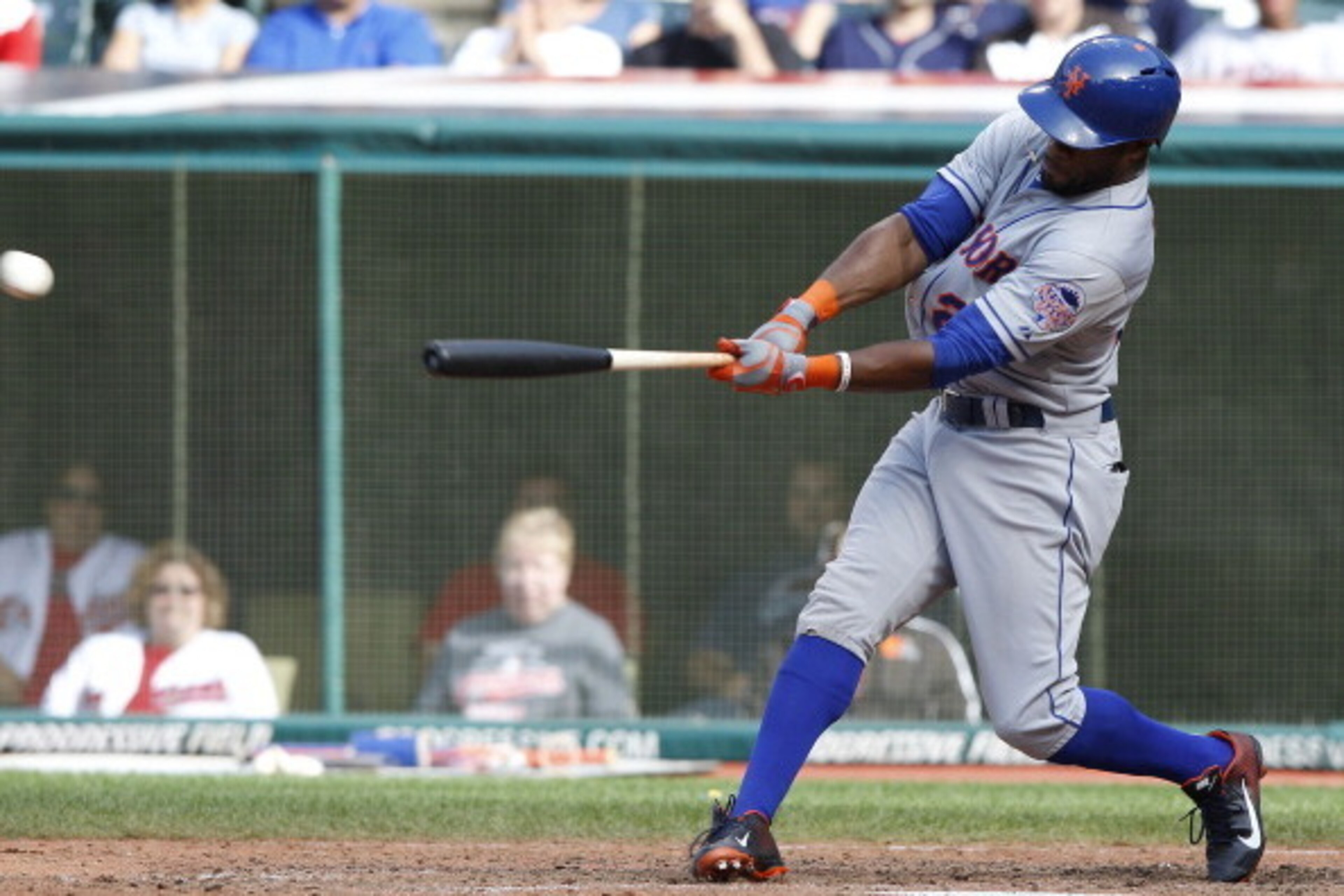 CLEVELAND, OH - SEPTEMBER 8:  Eric Young #22 of the New York Mets hits an RBI double to score teammate Matt den Dekker #6 during the ninth inning against the Cleveland Indians in their game on September 8, 2013 at Progressive Field in Cleveland, Ohio.  Th