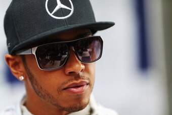 MELBOURNE, AUSTRALIA - MARCH 16:  Lewis Hamilton of Great Britain and Mercedes GP attends the drivers parade before the Australian Formula One Grand Prix at Albert Park on March 16, 2014 in Melbourne, Australia.  (Photo by Mark Thompson/Getty Images)