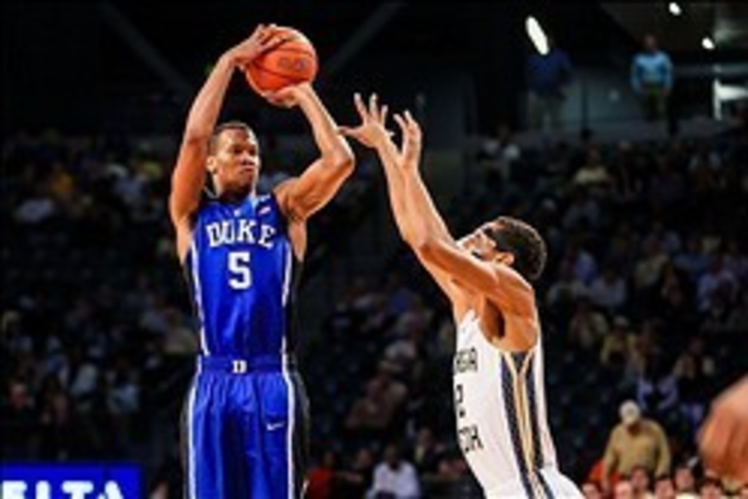 Feb 18, 2014; Atlanta, GA, USA; Duke Blue Devils forward Rodney Hood (5) shoots over Georgia Tech Yellow Jackets forward Quinton Stephens (12) in the second half at Hank McCamish Pavilion. Duke won 68-51. Mandatory Credit: Daniel Shirey-USA TODAY Sports