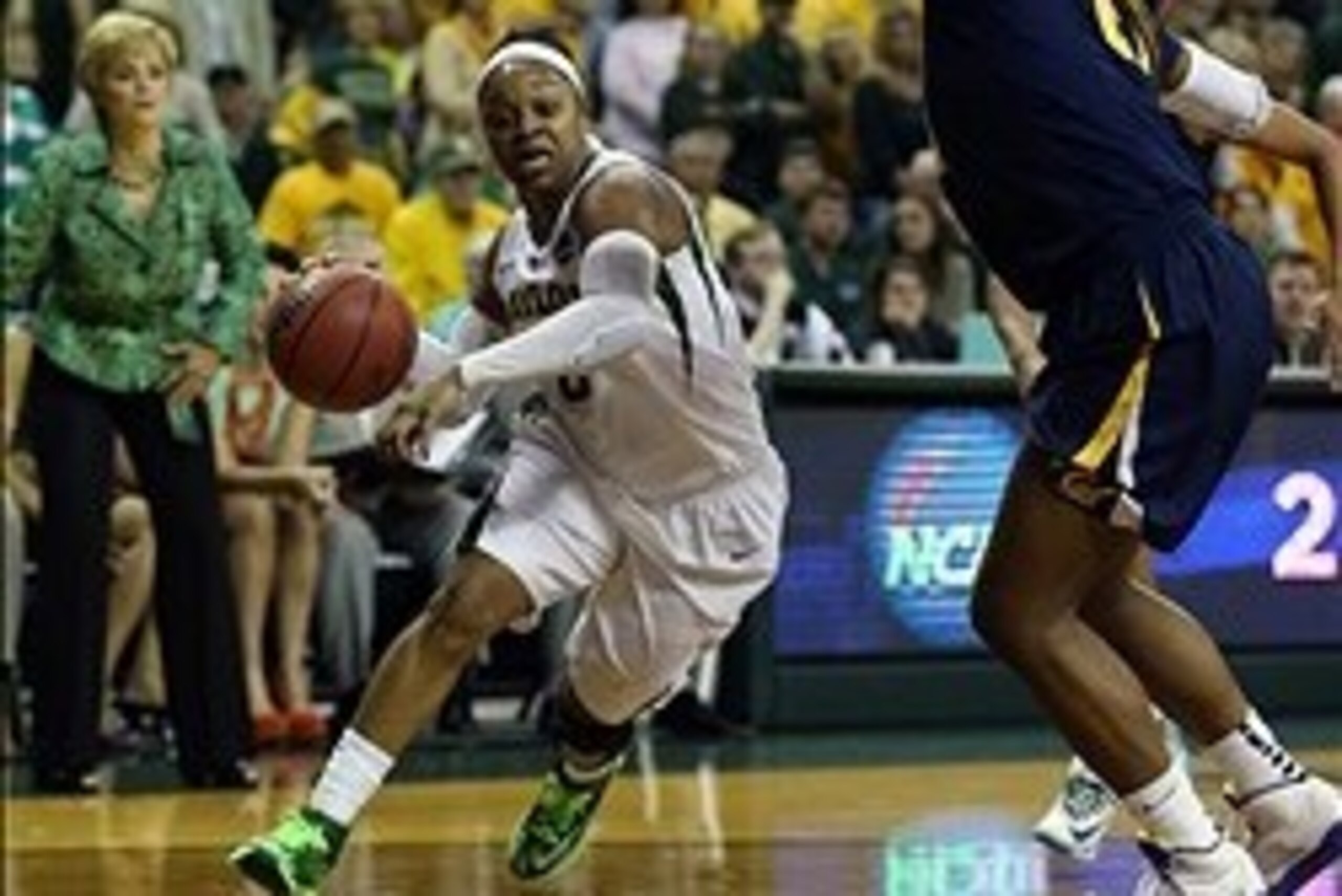 Mar 24, 2014; Waco, TX, USA; Baylor Bears guard Odyssey Sims (0) drives against California Golden Bears forward Reshanda Gray (21) in the second half of a women's college basketball game in the second round of the NCAA Tournament at the Ferrell Center. Th