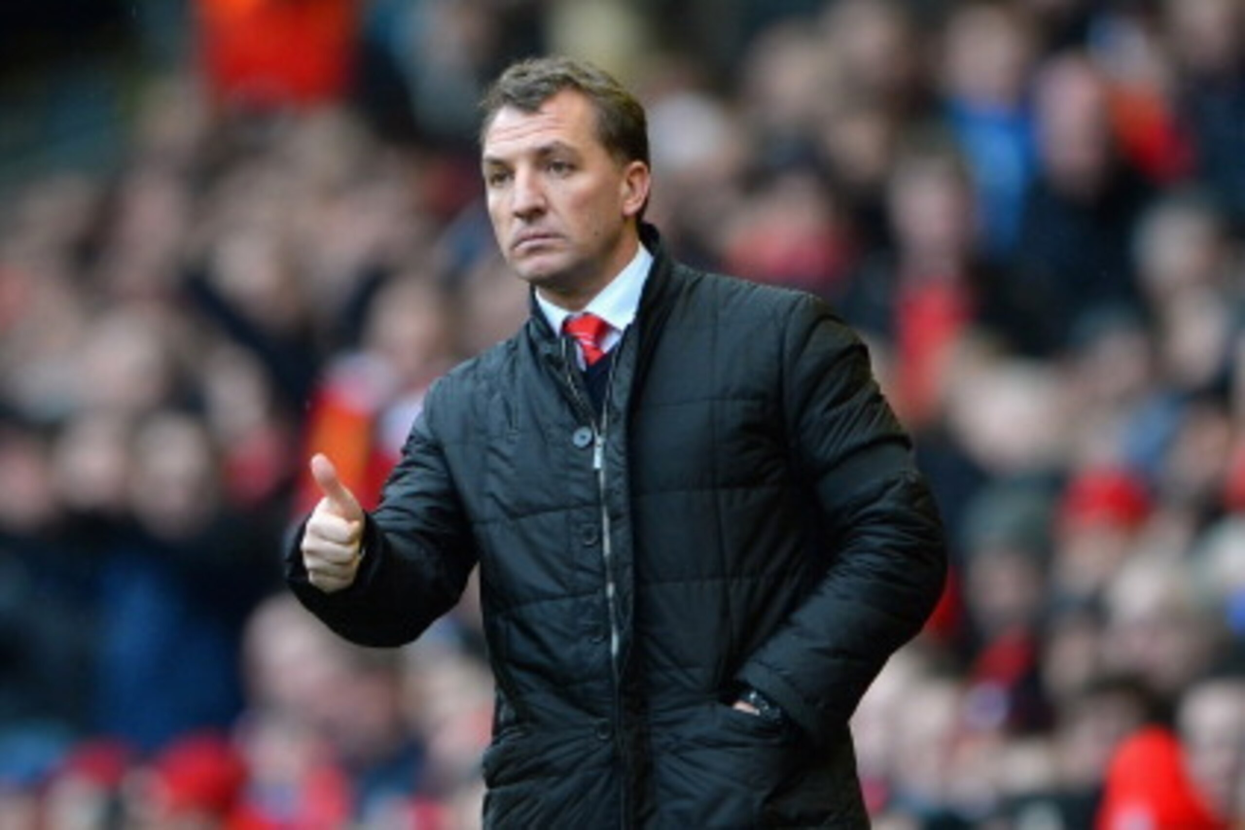 LIVERPOOL, ENGLAND - FEBRUARY 08:  Liverpool Manager Brendan Rodgers gives a thumbs up during the Barclays Premier League match between Liverpool and Arsenal at Anfield on February 8, 2014 in Liverpool, England.  (Photo by Michael Regan/Getty Images)