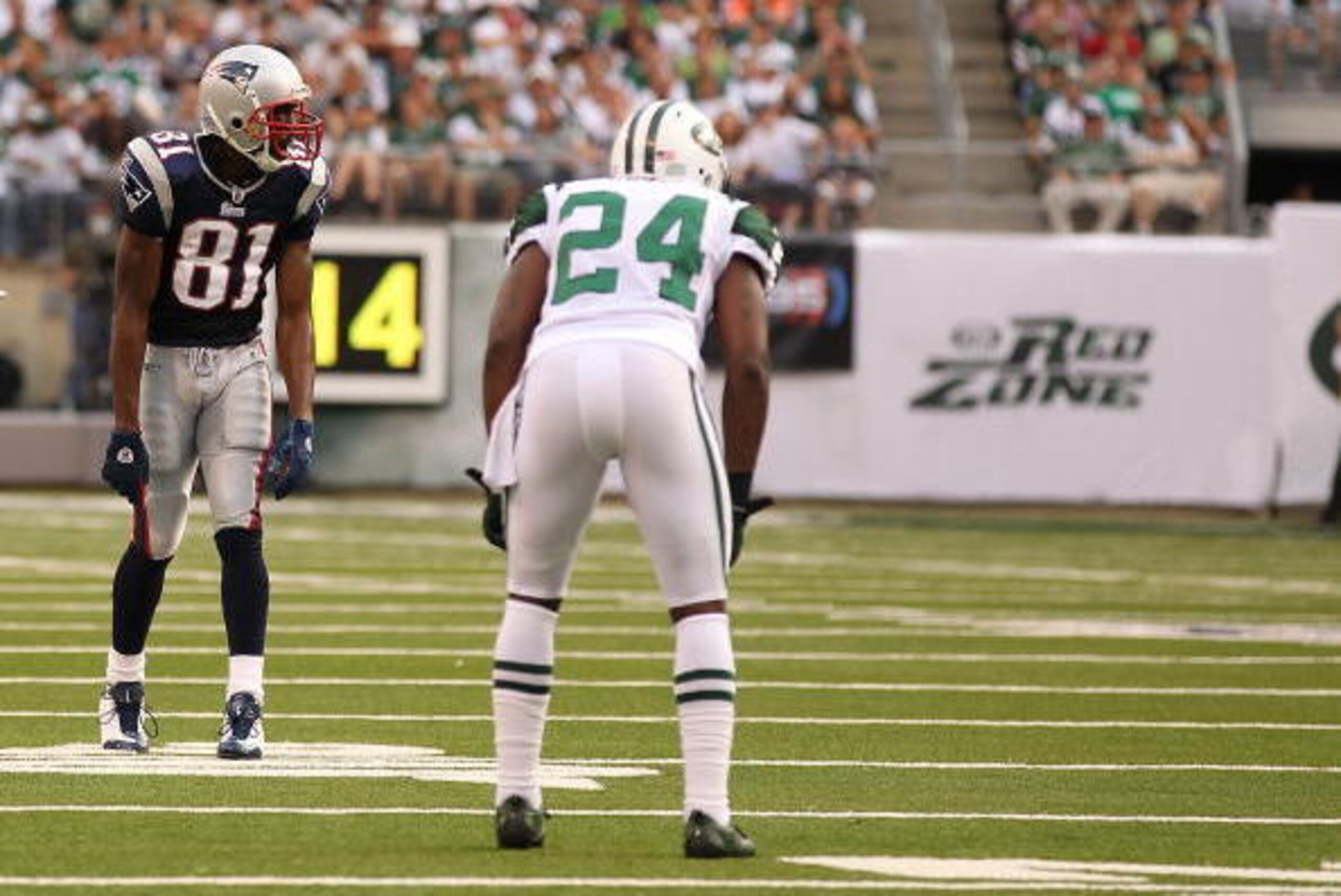 EAST RUTHERFORD, NJ - SEPTEMBER 19:  Darrelle Revis #24 of the New York Jets defends against Randy Moss #81 of the New England Patriots during their  game on September 19, 2010 at the New Meadowlands Stadium  in East Rutherford, New Jersey.  (Photo by Al