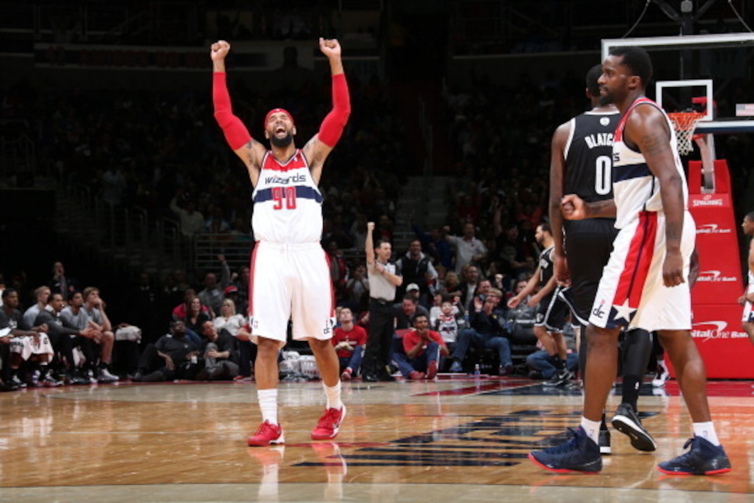 WASHINGTON, DC - MARCH 15: Drew Gooden #90 of the Washington Wizards celebrates during a game against the Brooklyn Nets at the Verizon Center on March 15, 2014 in Washington, DC. NOTE TO USER: User expressly acknowledges and agrees that, by downloading an