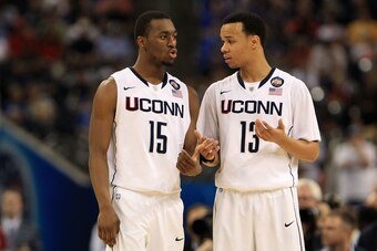 HOUSTON, TX - APRIL 02:  Kemba Walker #15 and Shabazz Napier #13 of the Connecticut Huskies talk on the court against the Kentucky Wildcats during the National Semifinal game of the 2011 NCAA Division I Men's Basketball Championship at Reliant Stadium on