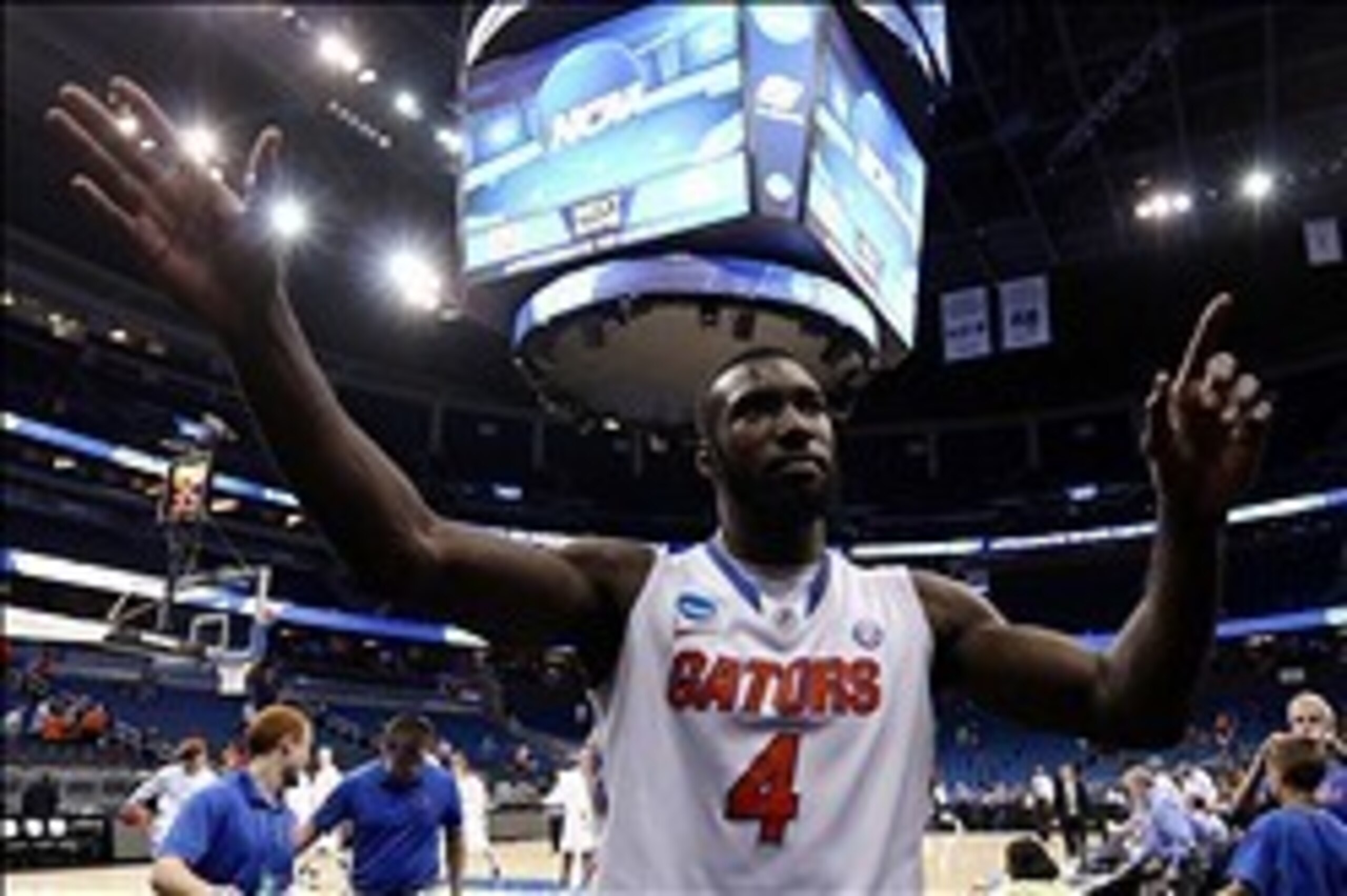 Mar 20, 2014; Orlando, FL, USA; Florida Gators center Patric Young (4) reacts after the men's college basketball game against the Albany Great Danes during the second round of the 2014 NCAA Tournament at Amway Center.  Florida won 67-55. Mandatory Credit: