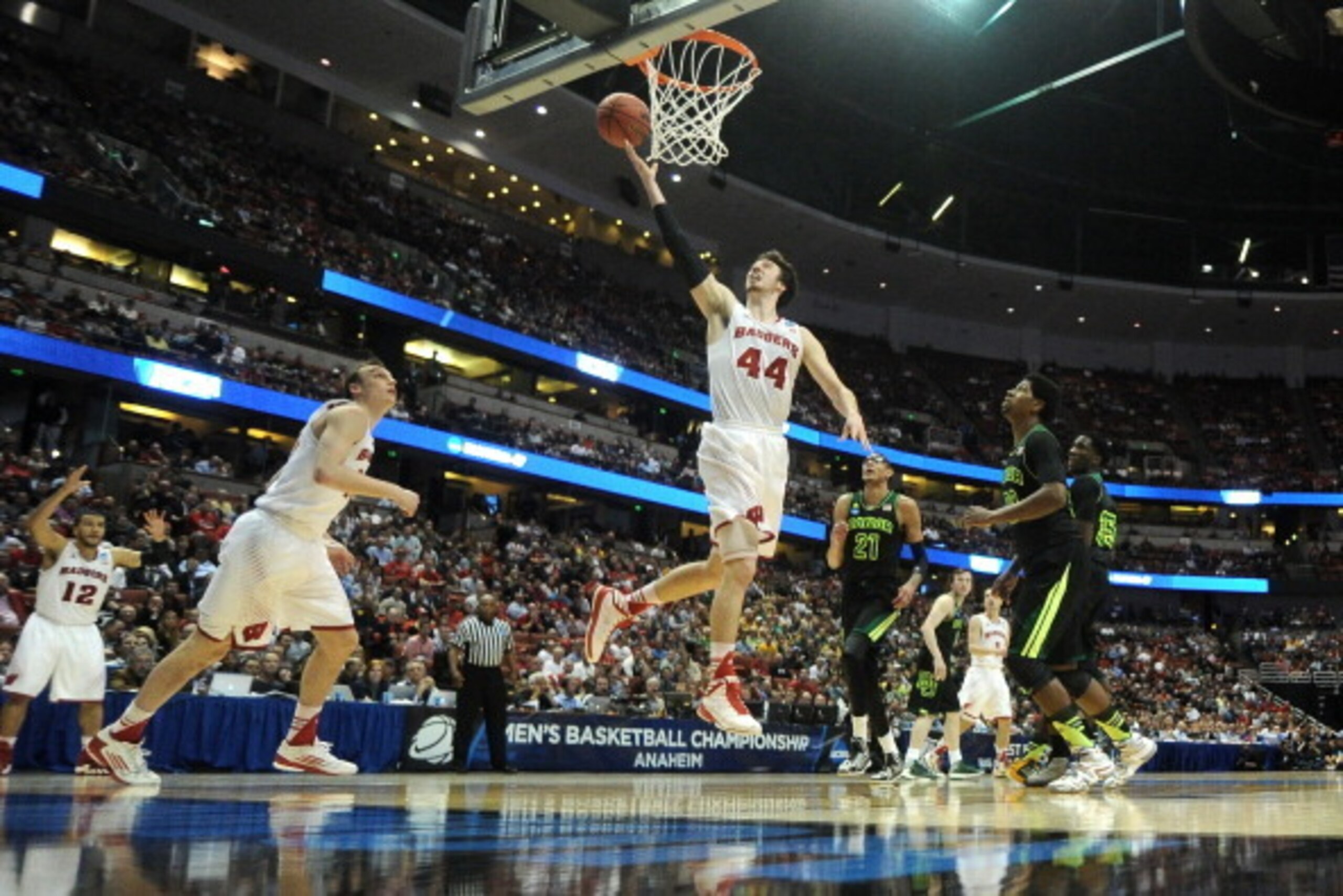 ANAHEIM, CA - MARCH 27:  Frank Kaminsky #44 of the Wisconsin Badgers goes up for a shot in the lane against the Baylor Bears during the regional semifinal of the 2014 NCAA Men's Basketball Tournament at the Honda Center on March 27, 2014 in Anaheim, Calif