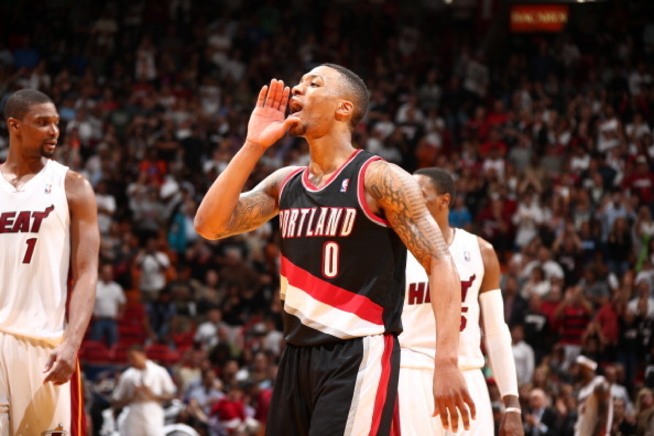 MIAMI, FL - MARCH 24: Damian Lillard #0 of the Portland Trail Blazers celebrates during the game against the Miami Heat on March 24, 2014 at American Airlines Arena in Miami, Florida. NOTE TO USER: User expressly acknowledges and agrees that, by downloa MIAMI, FL - MARCH 24: Damian Lillard #0 of the Portland Trail Blazers celebrates during the game against the Miami Heat on March 24, 2014 at American Airlines Arena in Miami, Florida. NOTE TO USER: User expressly acknowledges and agrees that, by downloa