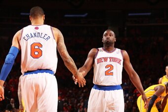 NEW YORK, NY - MAY 5: Tyson Chandler #6 of the New York Knicks high-fives teammate Raymond Felton #2 in Game One of the Eastern Conference Semifinals against the Indiana Pacers during the 2013 NBA Playoffs on May 5, 2013 at Madison Square Garden in New Yo
