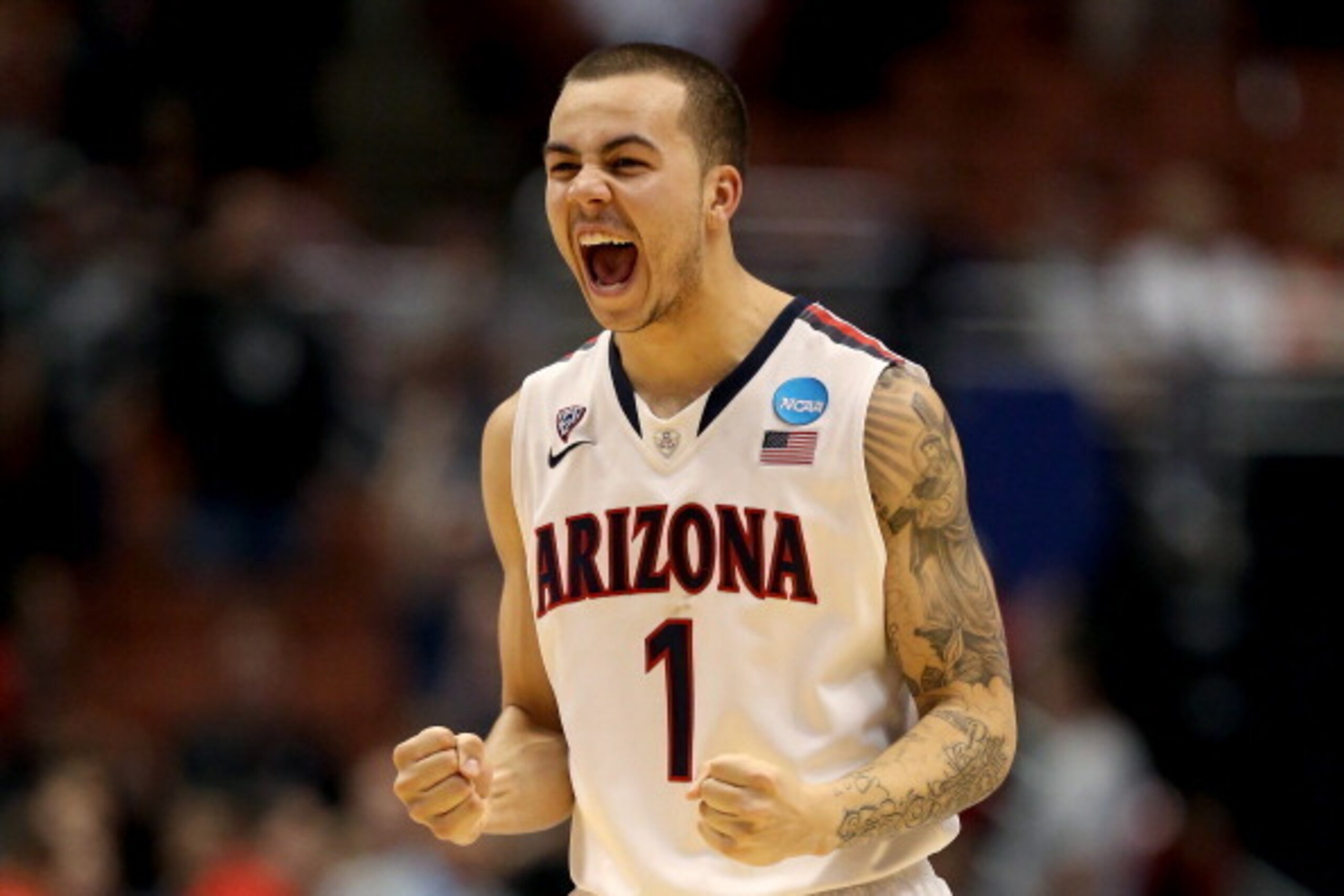 ANAHEIM, CA - MARCH 27:  Gabe York #1 of the Arizona Wildcats celebrates in the second half while taking on the San Diego State Aztecs during the regional semifinal of the 2014 NCAA Men's Basketball Tournament at the Honda Center on March 27, 2014 in Anah