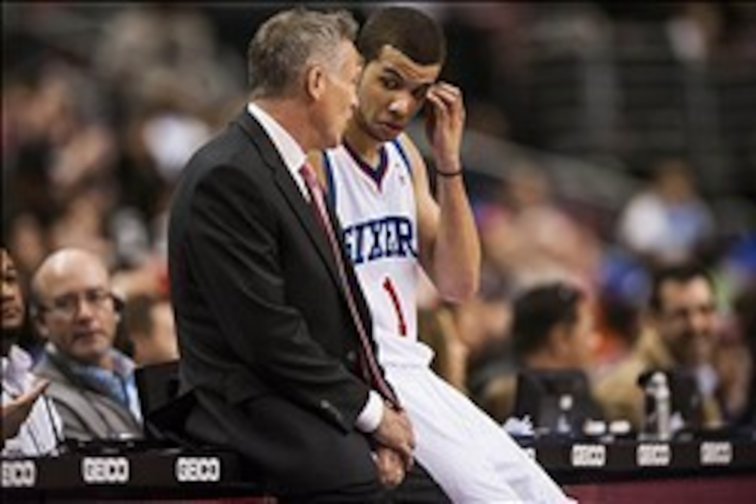 Mar 21, 2014; Philadelphia, PA, USA; Philadelphia 76ers head coach Brett Brown talks with guard Michael Carter-Williams (1) during the fourth quarter against the New York Knicks at the Wells Fargo Center. The Knicks defeated the Sixers 93-92. Mandatory Cr