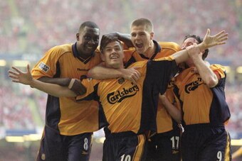 12 May 2001:  Michael Owen of Liverpool celebrates his equaliser with team mates Emile Heskey, Steven Gerrard and Robbie Fowler in the AXA Sponsored FA Cup Final against Arsenal at the Millennium Stadium in Cardiff, Wales. Liverpool won 2-1. \ Mandatory C