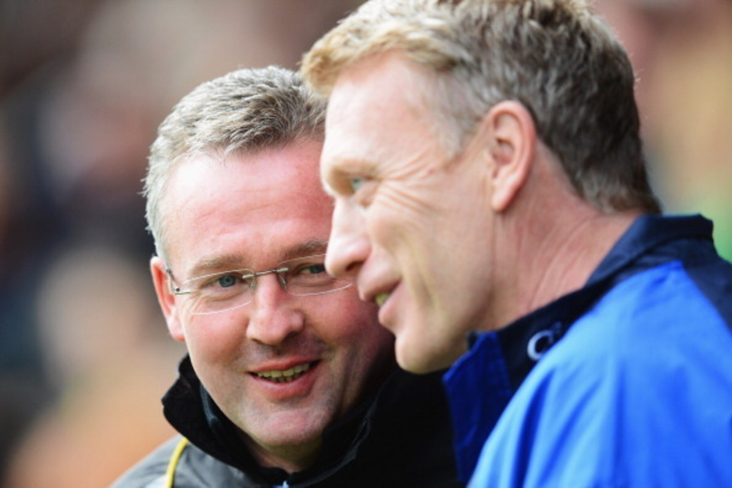 NORWICH, ENGLAND - APRIL 07:  Norwich manager Paul Lambert meets his counterpart Everton manager David Moyes prior to the Barclays Premier League match between Norwich City and Everton at Carrow Road on April 7, 2012 in Norwich, England.  (Photo by Mike H
