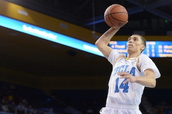 LOS ANGELES, CA - JANUARY 23:  Zach LaVine #14 of the UCLA Bruins dunks during a 91-74 win over the Stanford Cardinal at Pauley Pavilion on January 23, 2014 in Los Angeles, California.  (Photo by Harry How/Getty Images)