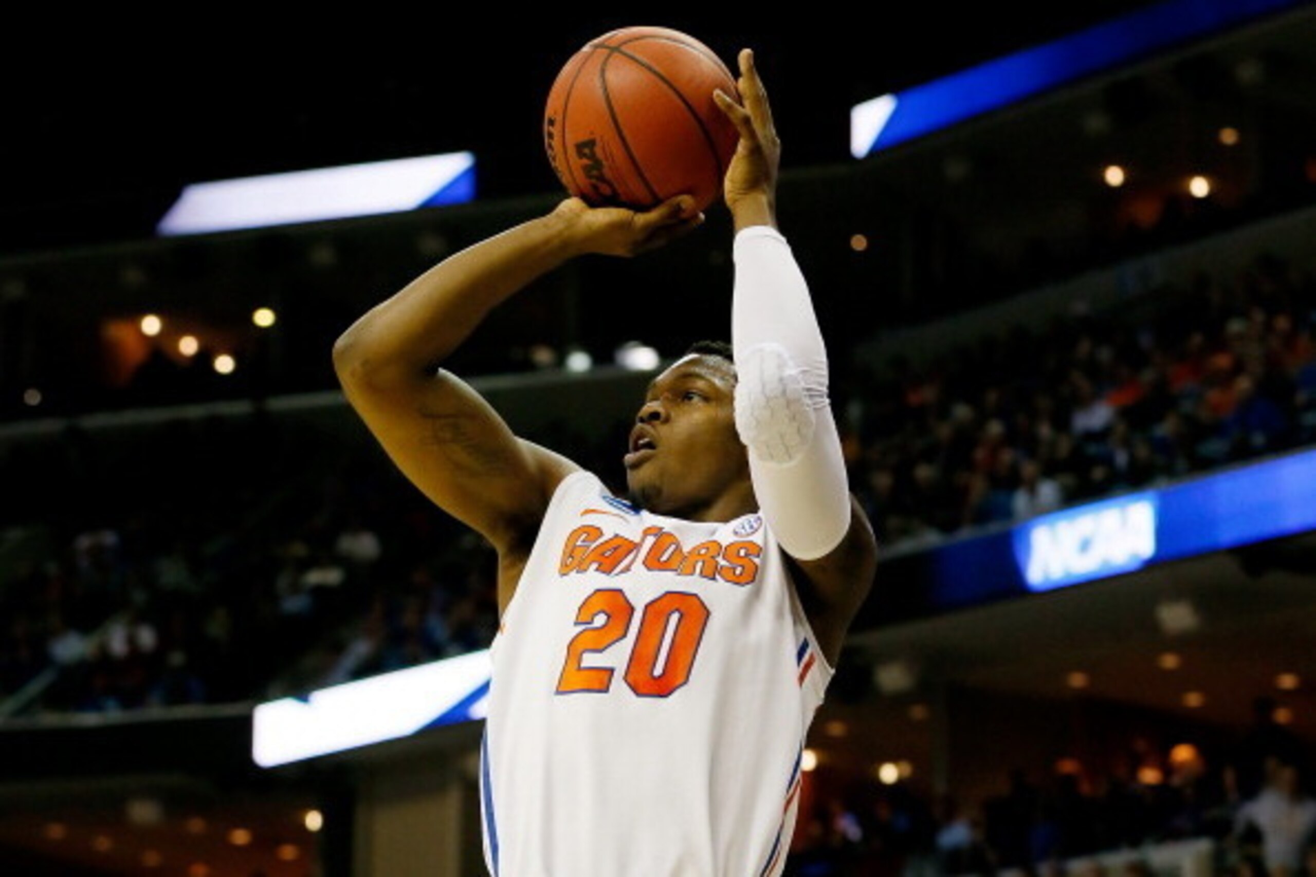 MEMPHIS, TN - MARCH 27:  Michael Frazier II #20 of the Florida Gators takes a shot against the UCLA Bruins during a regional semifinal of the 2014 NCAA Men's Basketball Tournament at the FedExForum on March 27, 2014 in Memphis, Tennessee.  (Photo by Kevin