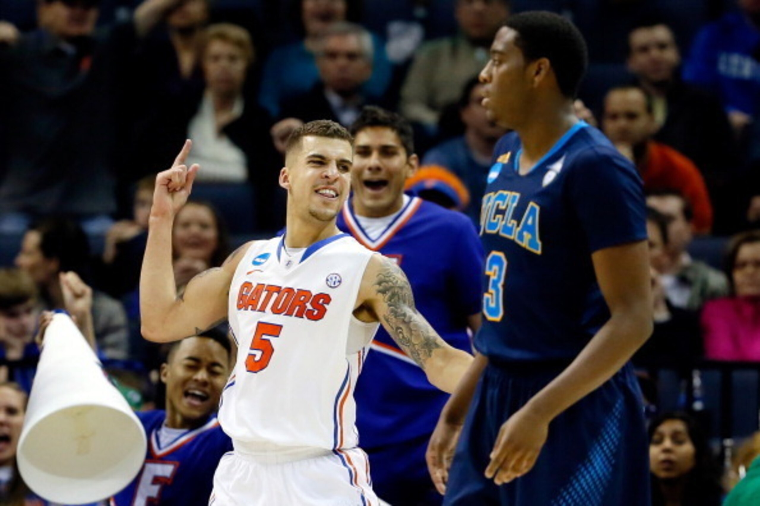 MEMPHIS, TN - MARCH 27:  Scottie Wilbekin #5 of the Florida Gators celebrates against the UCLA Bruins during a regional semifinal of the 2014 NCAA Men's Basketball Tournament at the FedExForum on March 27, 2014 in Memphis, Tennessee.  (Photo by Kevin C. C