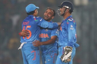 DHAKA, BANGLADESH - MARCH 23:  Amit Mishra celebrates after dismissing Marlon Samuels of the West Indies during the ICC World Twenty20 Bangladesh 2014 match between the West Indies and India at Sher-e-Bangla Mirpur Stadium on March 23, 2014 in Dhaka, Bang