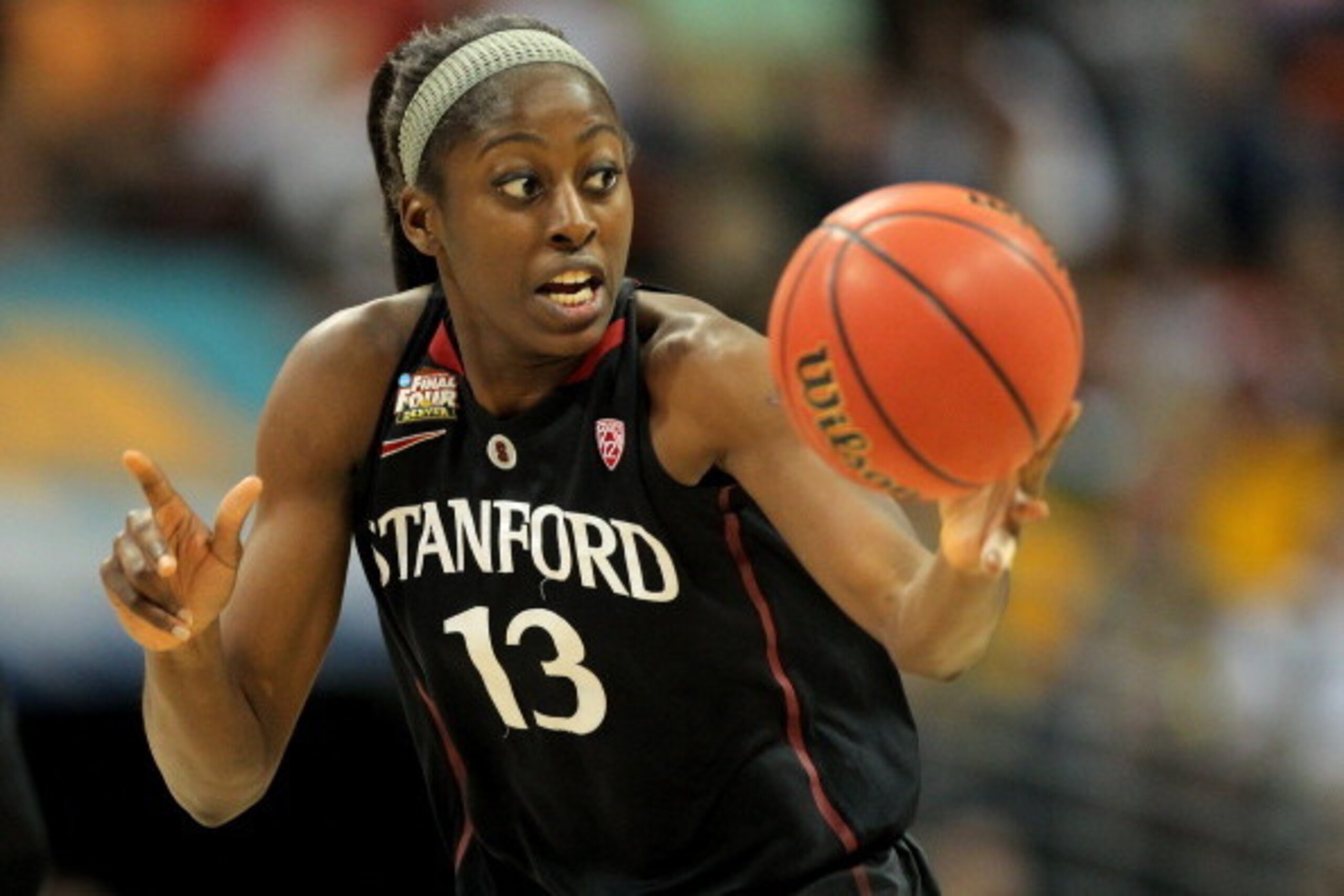 DENVER, CO - APRIL 01:  Chiney Ogwumike #13 of the Stanford Cardinal pushes the ball up court against the Baylor Bears uring the National Semifinal game of the 2012 NCAA Division I Women's Basketball Championship at Pepsi Center on April 1, 2012 in Denver