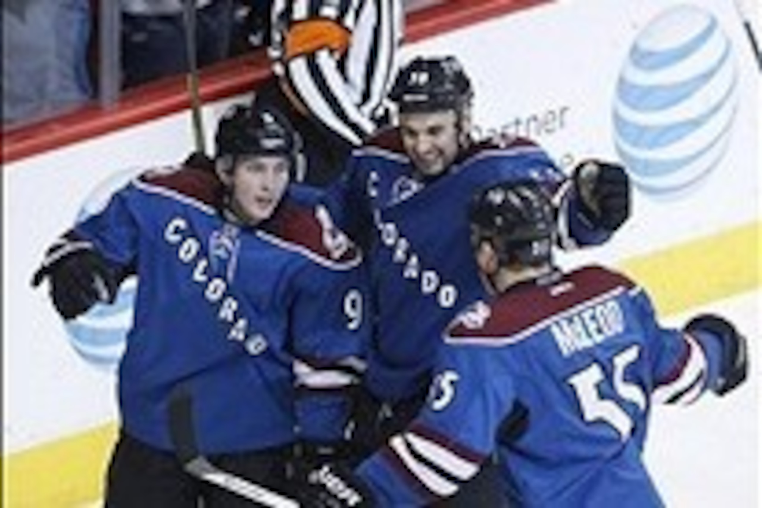 Mar 27, 2014; Denver, CO, USA; Colorado Avalanche center Matt Duchene (9) celebrates after scoring a goal with forwards Patrick Bordeleau (58) and Cody McLeod (55) during the first period against the Vancouver Canucks at Pepsi Center. Mandatory Credit: Ch