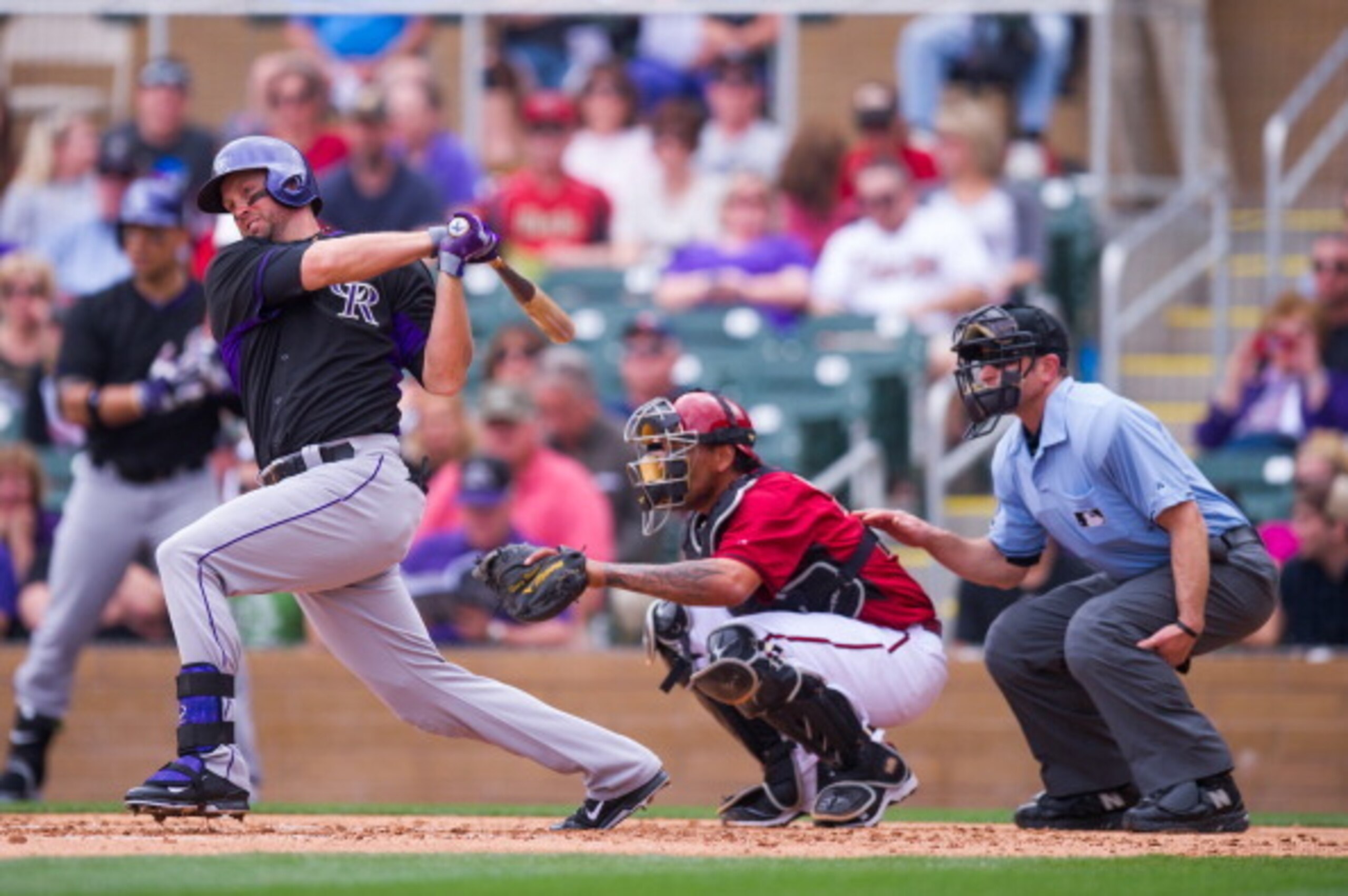 SCOTTSDALE, AZ - FEBRUARY 28: Michael Cuddyer #3 of the Colorado Rockies bats during a spring training game against the Arizona Diamondbacks at Salt River Fields at Talking Stick on February 28, 2014 in Scottsdale, Arizona. (Photo by Rob Tringali/Getty Im