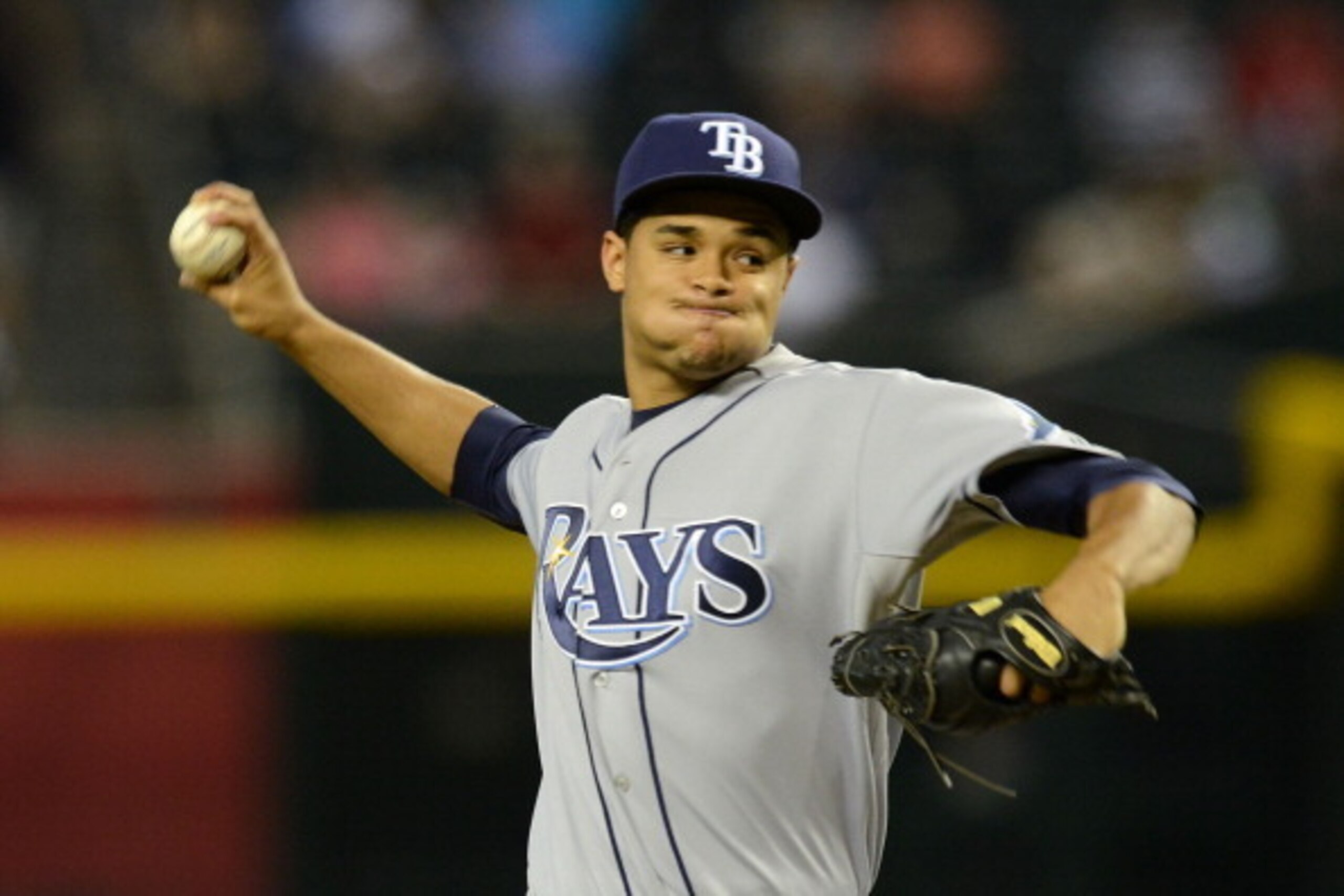 PHOENIX, AZ - AUGUST 07:  Chris Archer #22 of the Tampa Bay Rays delivers a pitch against the Arizona Diamondbacks at Chase Field on August 7, 2013 in Phoenix, Arizona.  (Photo by Norm Hall/Getty Images)