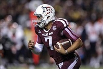 Nov 2, 2013; College Station, TX, USA; Texas A&M Aggies quarterback Kenny Hill (7) runs with the ball during the third quarter against the UTEP Miners at Kyle Field. Mandatory Credit: Troy Taormina-USA TODAY Sports