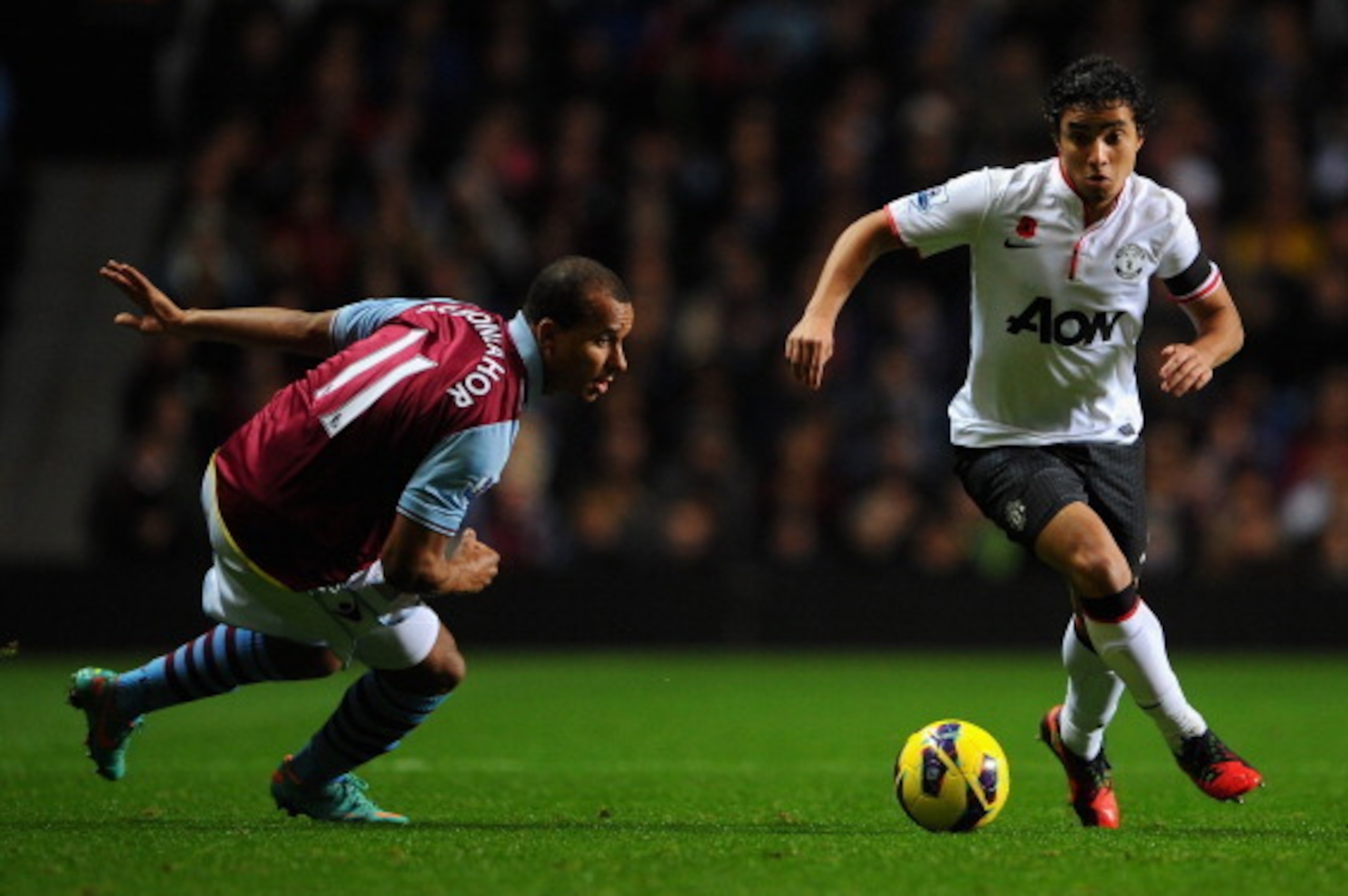 BIRMINGHAM, ENGLAND - NOVEMBER 10:   Rafael of Manchester United competes with Gabriel Agbonlahor of Aston Villa during the Barclays Premier league match between Aston Villa and Manchester United at Villa Park on November 10, 2012 in Birmingham, England. 