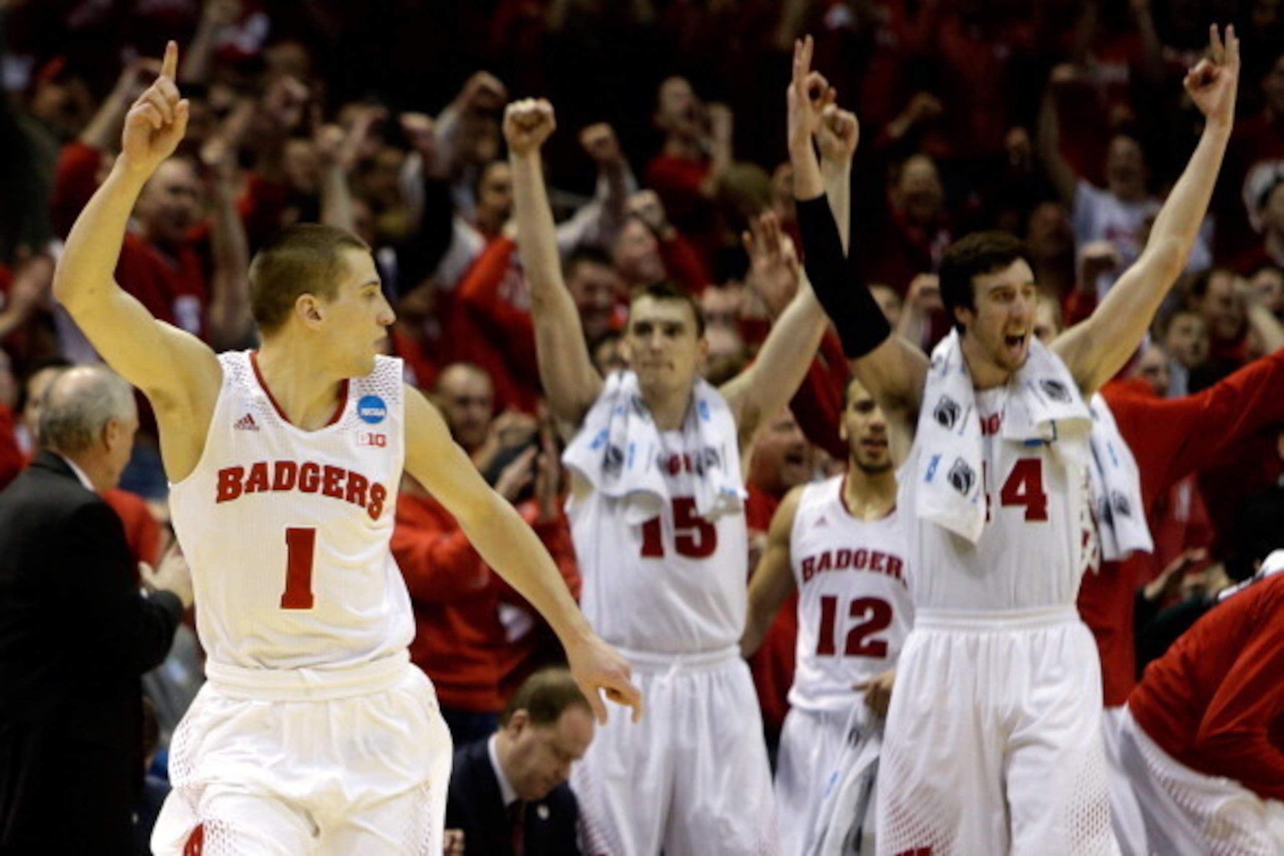 MILWAUKEE, WI - MARCH 22:  Ben Brust #1 of the Wisconsin Badgers celebrates a three point shot in the second half against the Oregon Ducks during the third round of the 2014 NCAA Men's Basketball Tournament at BMO Harris Bradley Center on March 22, 2014 i