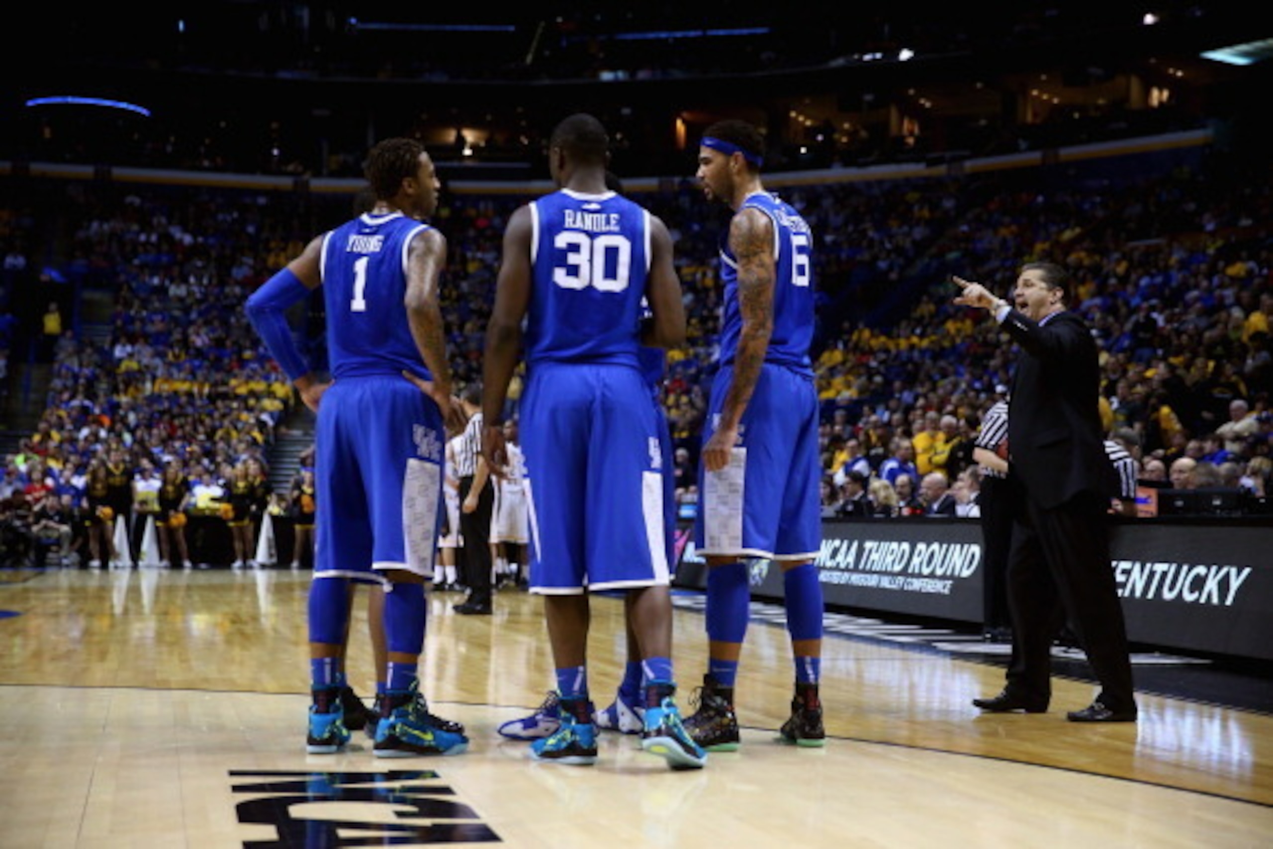 ST LOUIS, MO - MARCH 23:  Head coach John Calipari of the Kentucky Wildcats shouts to his team against the Wichita State Shockers during the third round of the 2014 NCAA Men's Basketball Tournament at Scottrade Center on March 23, 2014 in St Louis, Missou