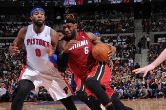 AUBURN HILLS, MI - MARCH 28: LeBron James #6 of the Miami Heat drives to the basket against the Detroit Pistons on March 28, 2014 at The Palace of Auburn Hills in Auburn Hills, Michigan. NOTE TO USER: User expressly acknowledges and agrees that, by downlo