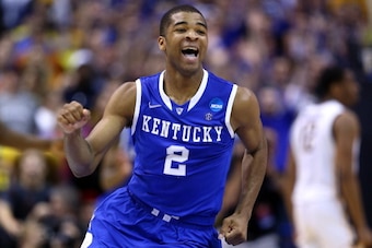 ST LOUIS, MO - MARCH 23:  Aaron Harrison #2 of the Kentucky Wildcats celebrates after defeating the Wichita State Shockers 78 to 76 during the third round of the 2014 NCAA Men's Basketball Tournament at Scottrade Center on March 23, 2014 in St Louis, Miss