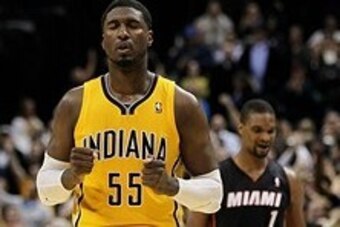 Mar 26, 2014; Indianapolis, IN, USA;  Indiana Pacers center Roy Hibbert (55) reacts at the end of the game against the Miami Heat at Bankers Life Fieldhouse. The Pacers won 84-83. Mandatory Credit: Pat Lovell-USA TODAY Sports