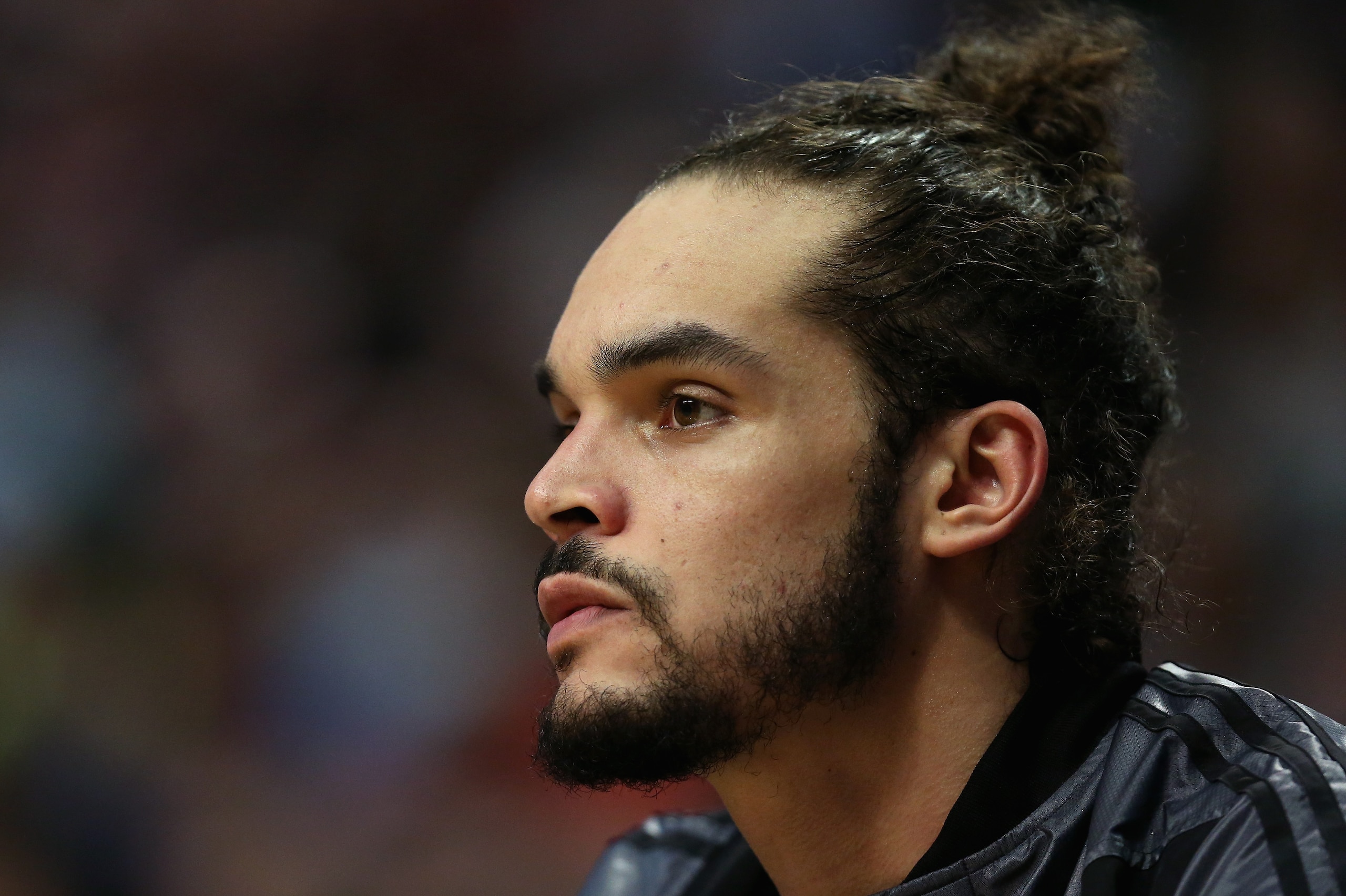 CHICAGO, IL - MARCH 17: Joakim Noah #13 of the Chicago Bulls watches from the bench as his teammates take on the Oklahoma City Thunder at the United Center on March 17, 2014 in Chicago, Illinois. The Thunder defeated the Bulls 97-85. NOTE TO USER: User ex