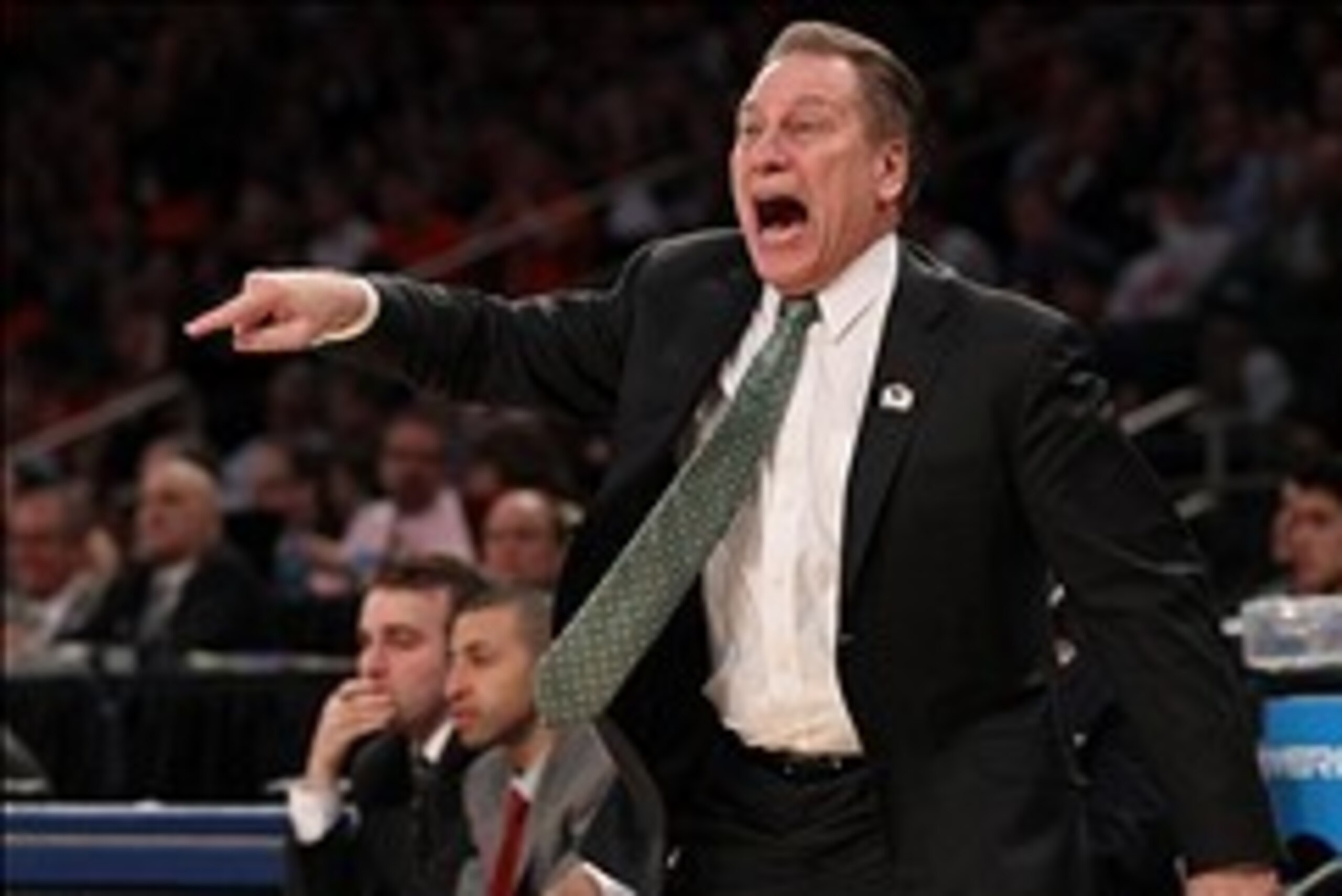 Mar 28, 2014; New York, NY, USA; Michigan State Spartans head coach Tom Izzo reacts during the first half against the Virginia Cavaliers in the semifinals of the east regional of the 2014 NCAA Mens Basketball Championship tournament at Madison Square Gard Mar 28, 2014; New York, NY, USA; Michigan State Spartans head coach Tom Izzo reacts during the first half against the Virginia Cavaliers in the semifinals of the east regional of the 2014 NCAA Mens Basketball Championship tournament at Madison Square Gard