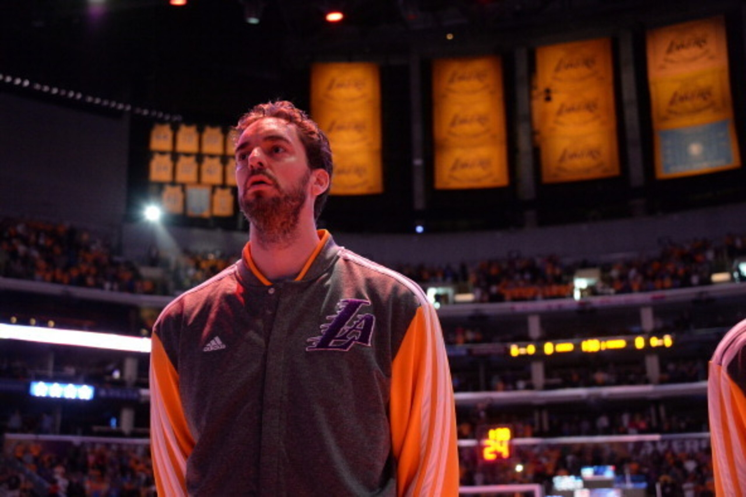 LOS ANGELES, CA - MARCH 9: Pau Gasol #16 of the Los Angeles Lakers stands in observance of the national anthem before a game against the Oklahoma City Thunder at STAPLES Center on March 9, 2014 in Los Angeles, California. NOTE TO USER: User expressly ackn