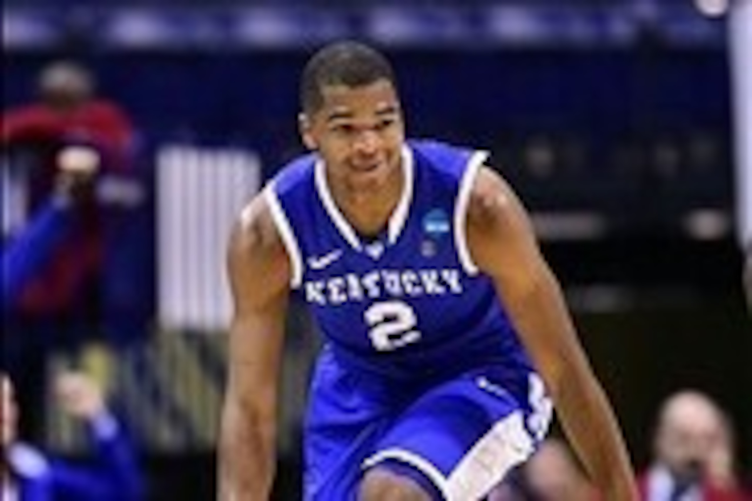 Mar 28, 2014; Indianapolis, IN, USA; Kentucky Wildcats guard Aaron Harrison (2) reacts after making a basket against the Louisville Cardinals in the second half in the semifinals of the midwest regional of the 2014 NCAA Mens Basketball Championship tourna