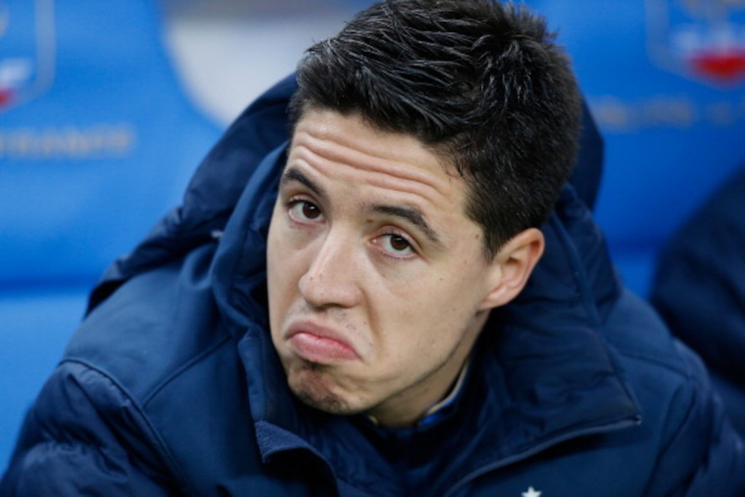 PARIS, FRANCE - NOVEMBER 19:  Samir Nasri of France looks on from the substitutes' bench prior to the FIFA 2014 World Cup Qualifier 2nd Leg Playoff between France and Ukraine at the Stade de France on November 19, 2013 in Paris, France.  (Photo by Harry E