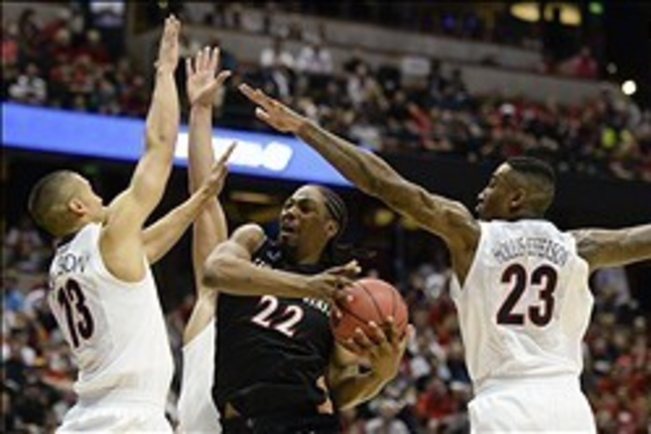 Mar 27, 2014; Anaheim, CA, USA; San Diego State Aztecs forward Josh Davis (22) drives to the basket between Arizona Wildcats guard Nick Johnson (13), forward Aaron Gordon (11, second from left), and forward Rondae Hollis-Jefferson (23) during the first ha Mar 27, 2014; Anaheim, CA, USA; San Diego State Aztecs forward Josh Davis (22) drives to the basket between Arizona Wildcats guard Nick Johnson (13), forward Aaron Gordon (11, second from left), and forward Rondae Hollis-Jefferson (23) during the first ha