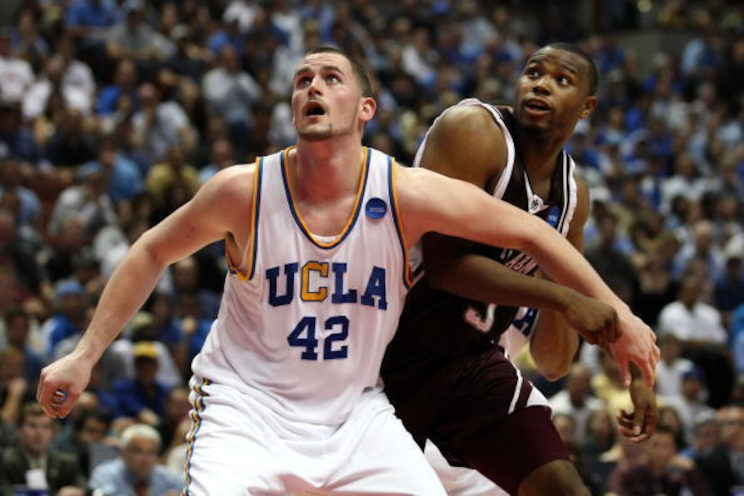 ANAHEIM, CA - MARCH 22:  Kevin Love #42 of the UCLA Bruins and Joseph Jones #30 of the Texas A&M Aggies fight for rebound position during the West Region second round of the NCAA Basketball Tournament at the Honda Center on March 22, 2008 in Anaheim, Cali