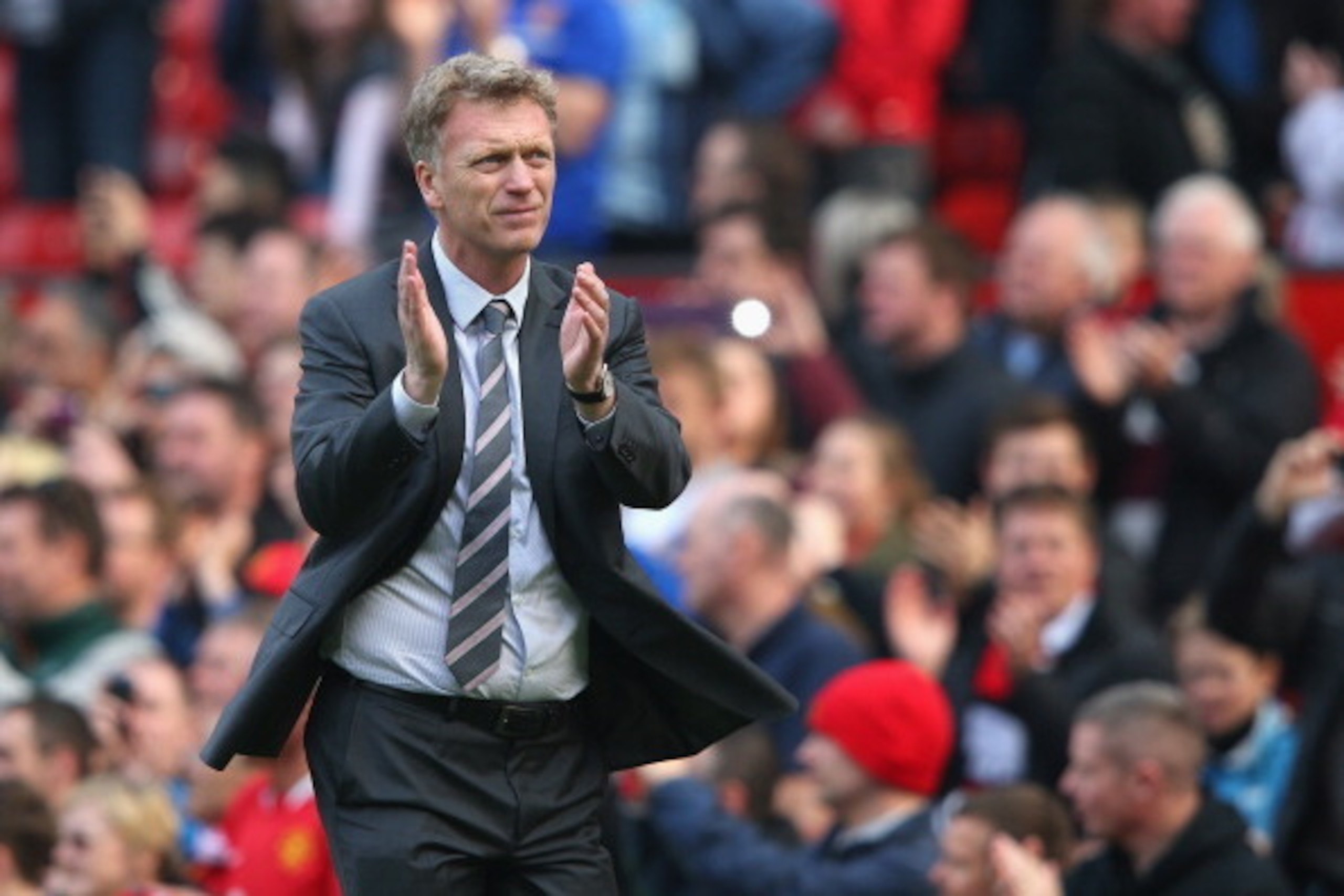 MANCHESTER, ENGLAND - MARCH 29:  Manchester United Manager David Moyes applauds the fans at the end of the Barclays Premier League match between Manchester United and Aston Villa at Old Trafford on March 29, 2014 in Manchester, England.  (Photo by Alex Li