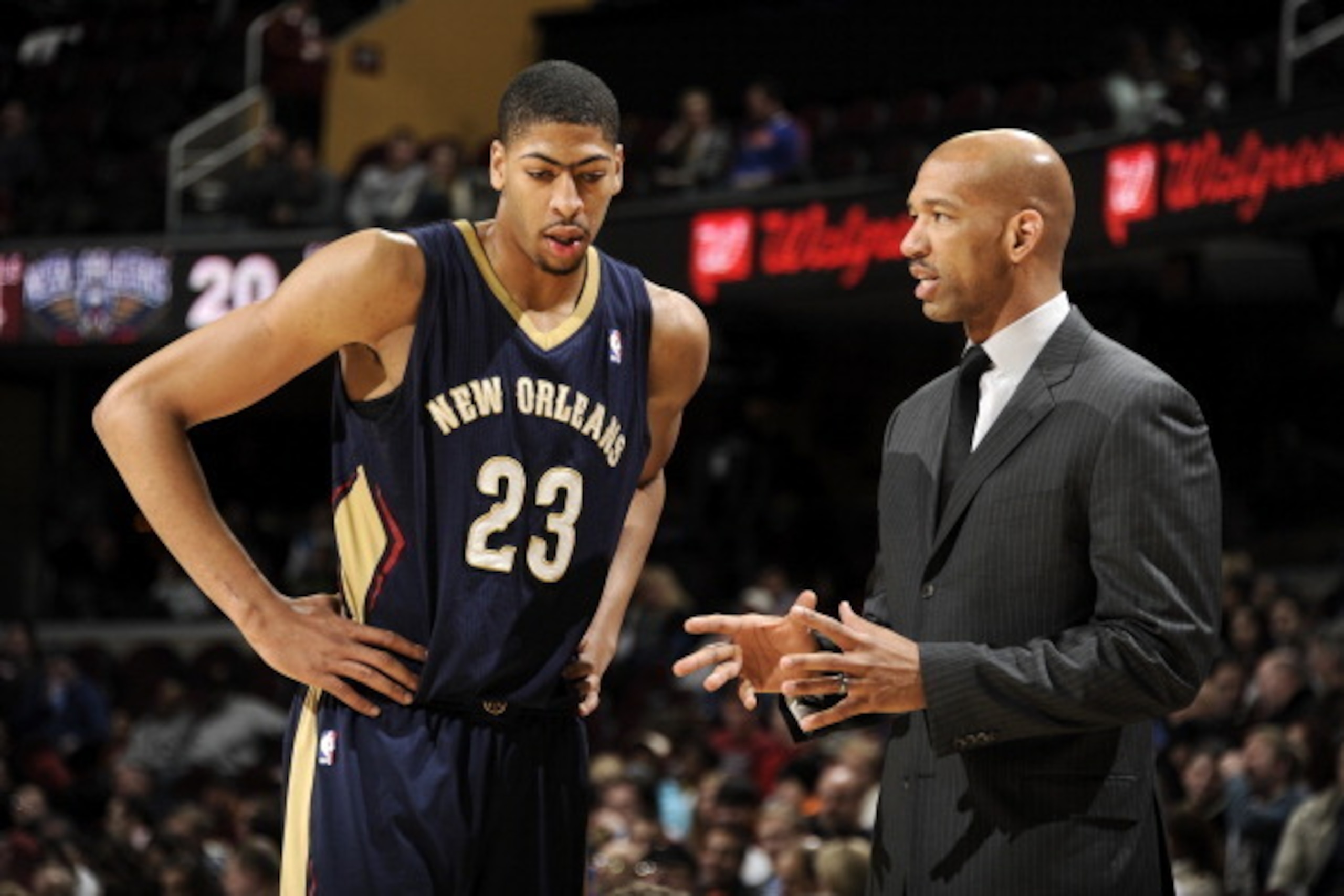 CLEVELAND, OH - JANUARY 28:  Head coach Monty Williams of the New Orleans Pelicans talks to Anthony Davis #23 during a break in the action against the Cleveland Cavaliers at The Quicken Loans Arena on January 28, 2014 in Cleveland, Ohio. NOTE TO USER: Use