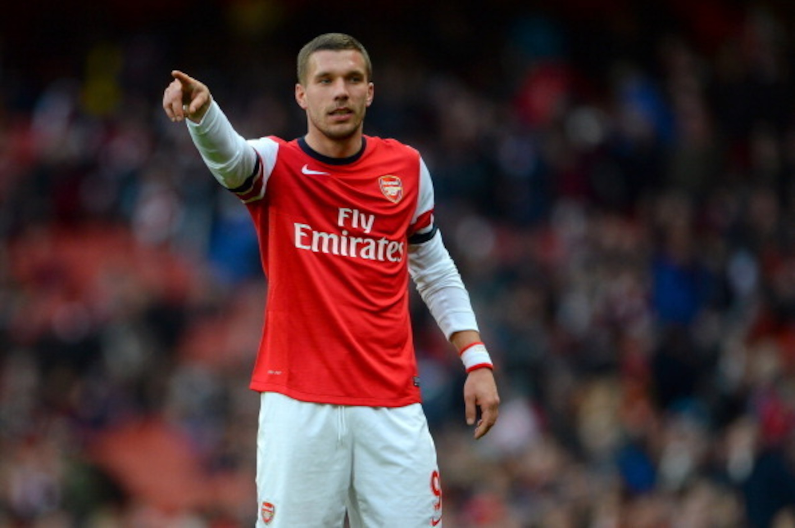 LONDON, ENGLAND - FEBRUARY 22:  Lukas Podolski of Arsenal gestures during the Barclays Premier League match between Arsenal and Sunderland at Emirates Stadium on February 22, 2014 in London, England.  (Photo by Michael Regan/Getty Images)